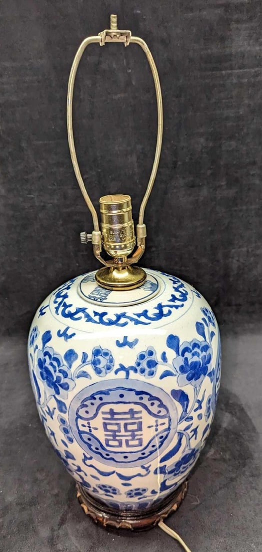 Vintage Chinese Blue & White Decorated Vase Lamp B: Vintage Chinese Blue & White Decorated Vase Lamp B. This is approx 9" x 9" x 16" and it weighs 5.49lbs. The harp is approx 3 3/4" x 3/4" x 9". The porcelain vase lamp has some chips on the wooden base