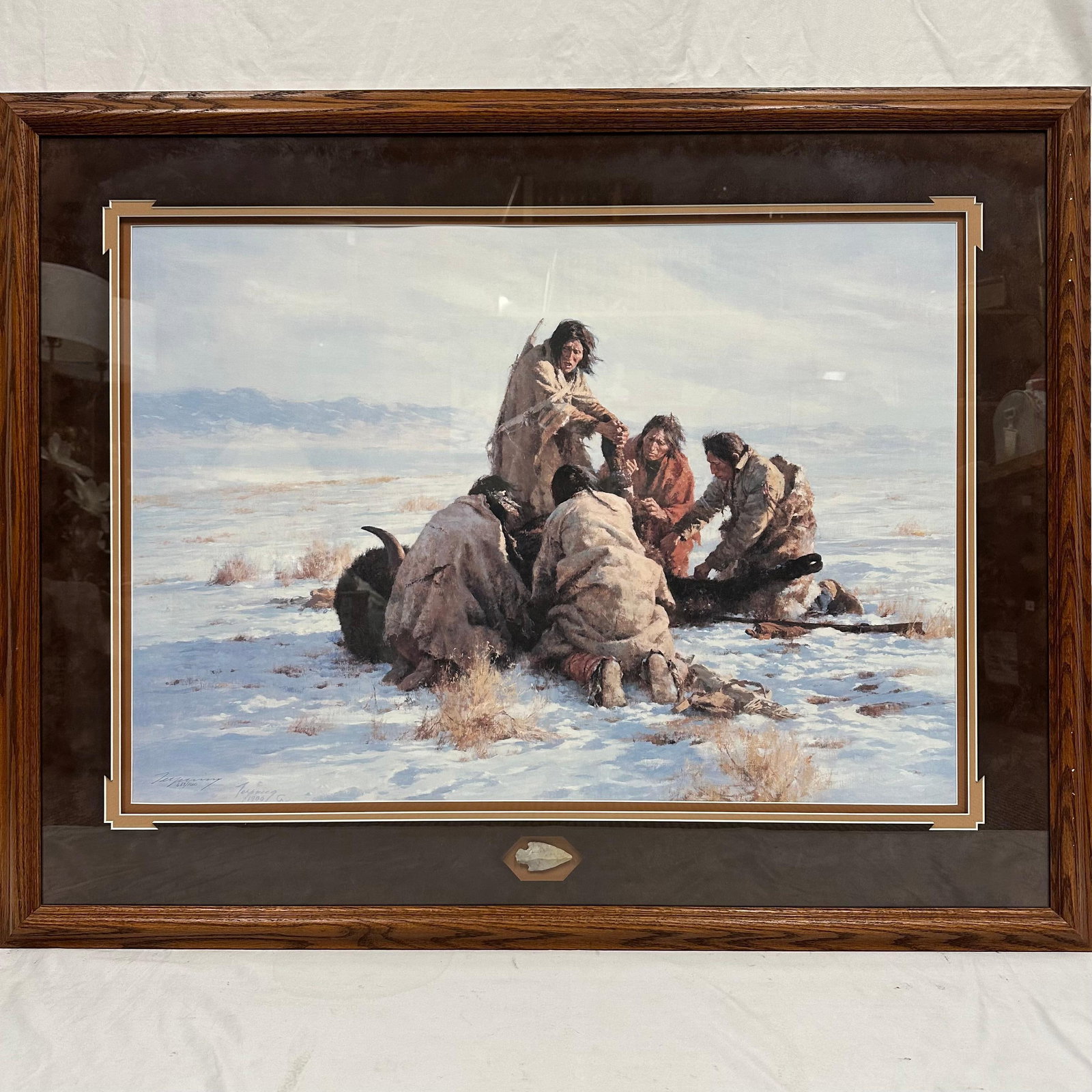 The Last Buffalo Howard Terpning Pencil Signed and Numbered with Arrowhead: Framed limited edition print hand-signed and numbered in pencil by artist Howard Terpning, titled The Last Buffalo. Edition number 683 out of 1000, dated 1986. Displayed in a wood frame with double