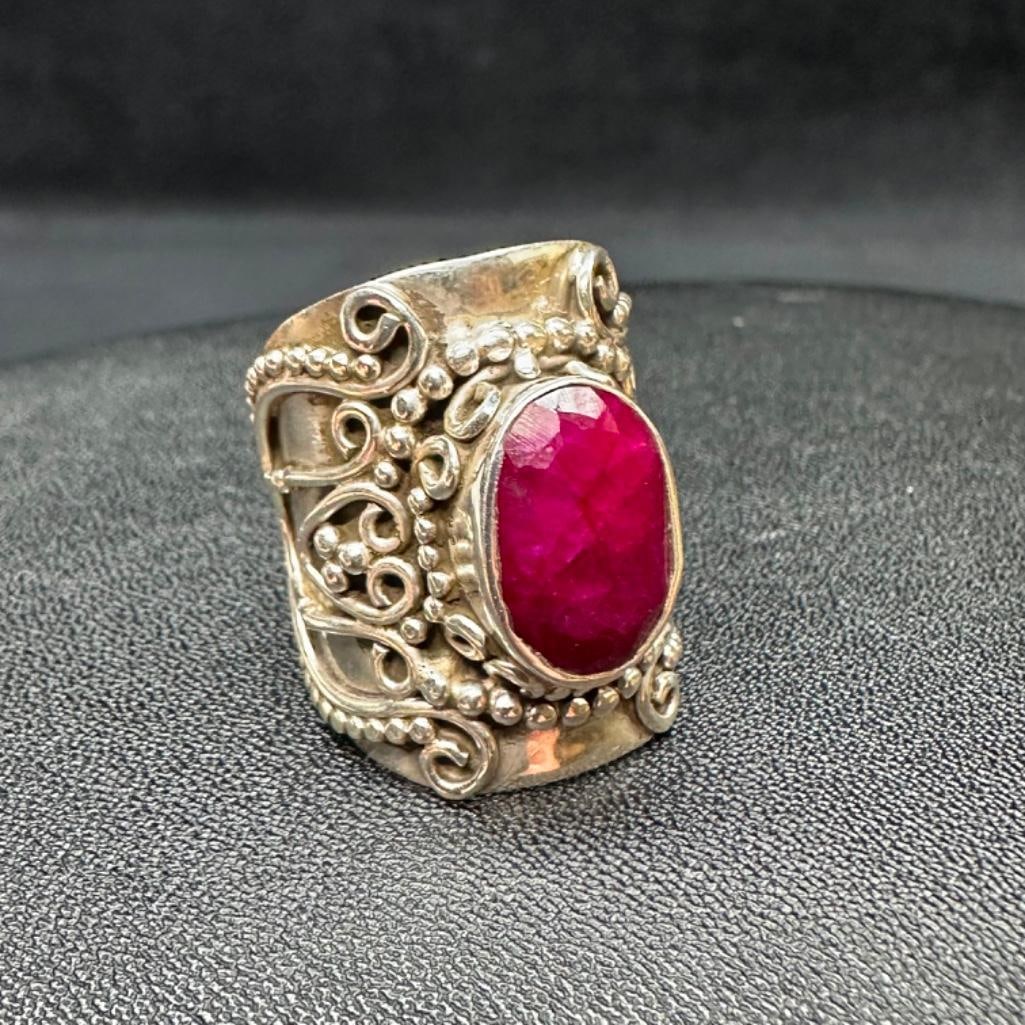 Sterling Bezel-Set Natural Oval Ruby Ring: This piece of jewelry has been tested and researched prior to listing. Please view all our pictures they are part of our description. DETAILS: Metal - Sterling Silver Color - Silver Stones - Hallmarks