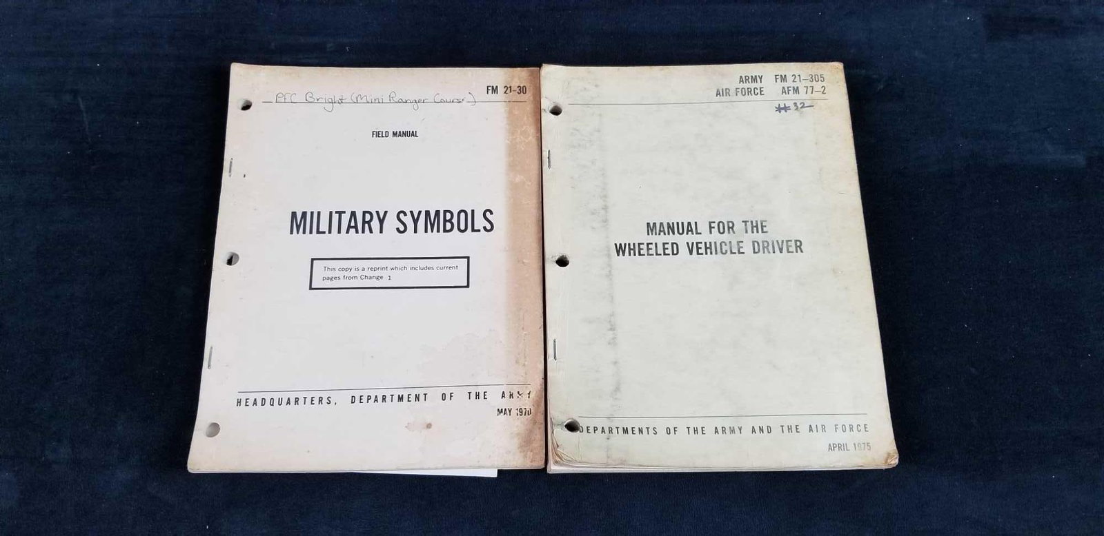 1970 1975 Military Field Manuals Army: This lot contains two Department of Army Field Manuals both in used condition. 1- Military Symbols FM21-30, Army, United States, May 1970- has foxing and stained on front cover. No known missing