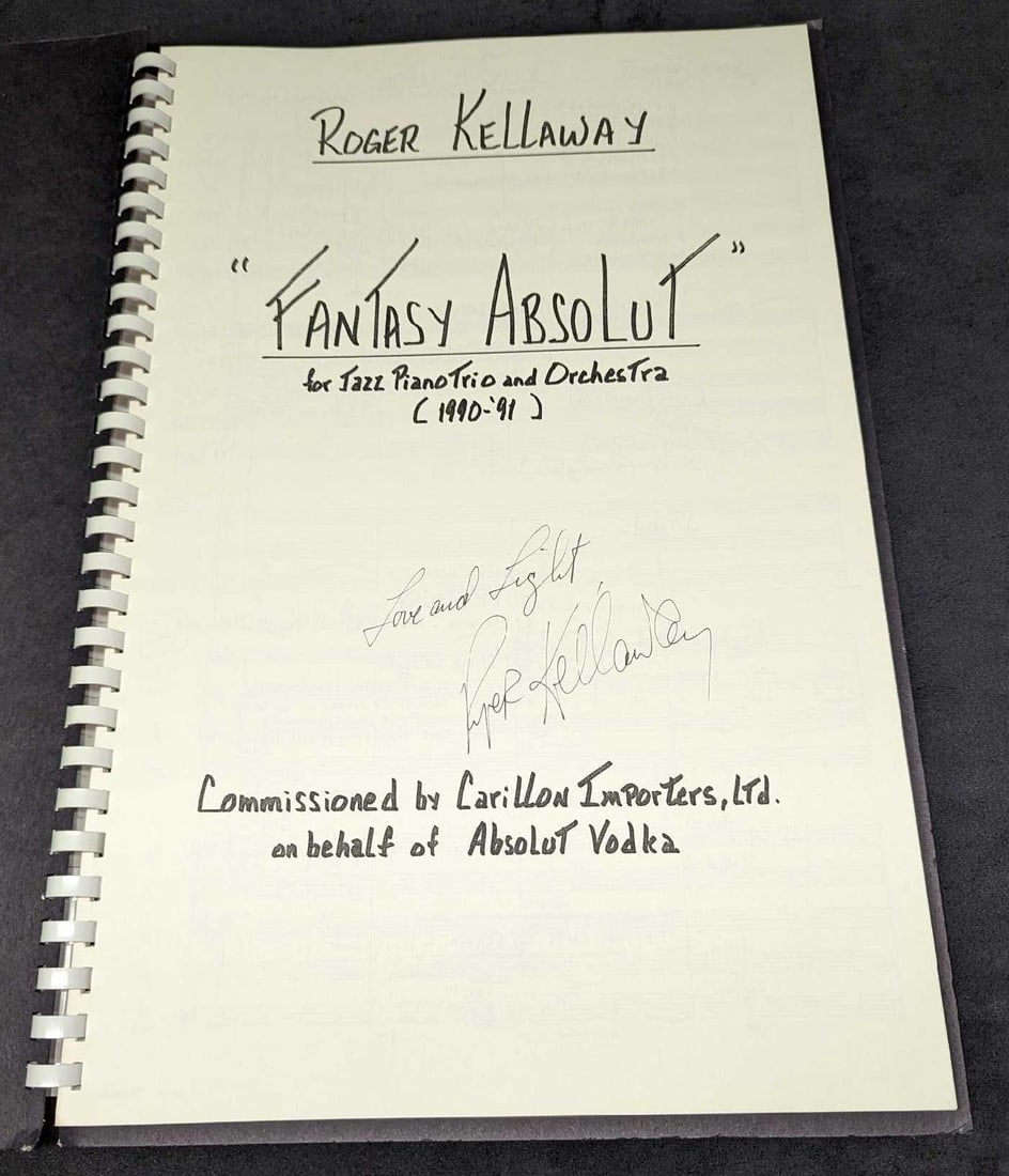 Roger Kellaway Autographed Fantasy Absolut Full Score Sheet Music Book: Roger Kellaway Autographed Fantasy Absolut Full Score Sheet Music Book. This is approx 11 3/4" x 3/4" x 17 1/2" and it weighs 1.25lb. The sheet music covers have some shelf wear. Plea