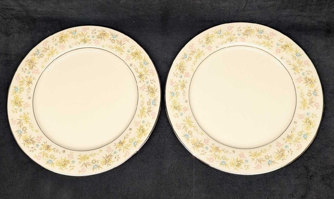 2 Retired Noritake Blossom Time Dinner Plates F: 2 Retired Noritake Blossom Time Dinner Plates F. Each plate is approx 10 3/8" x 10 3/8" x 7/8" and the total weight is 2.73 lbs. The bowls have no chips or cracks. One plate has light scratches. The
