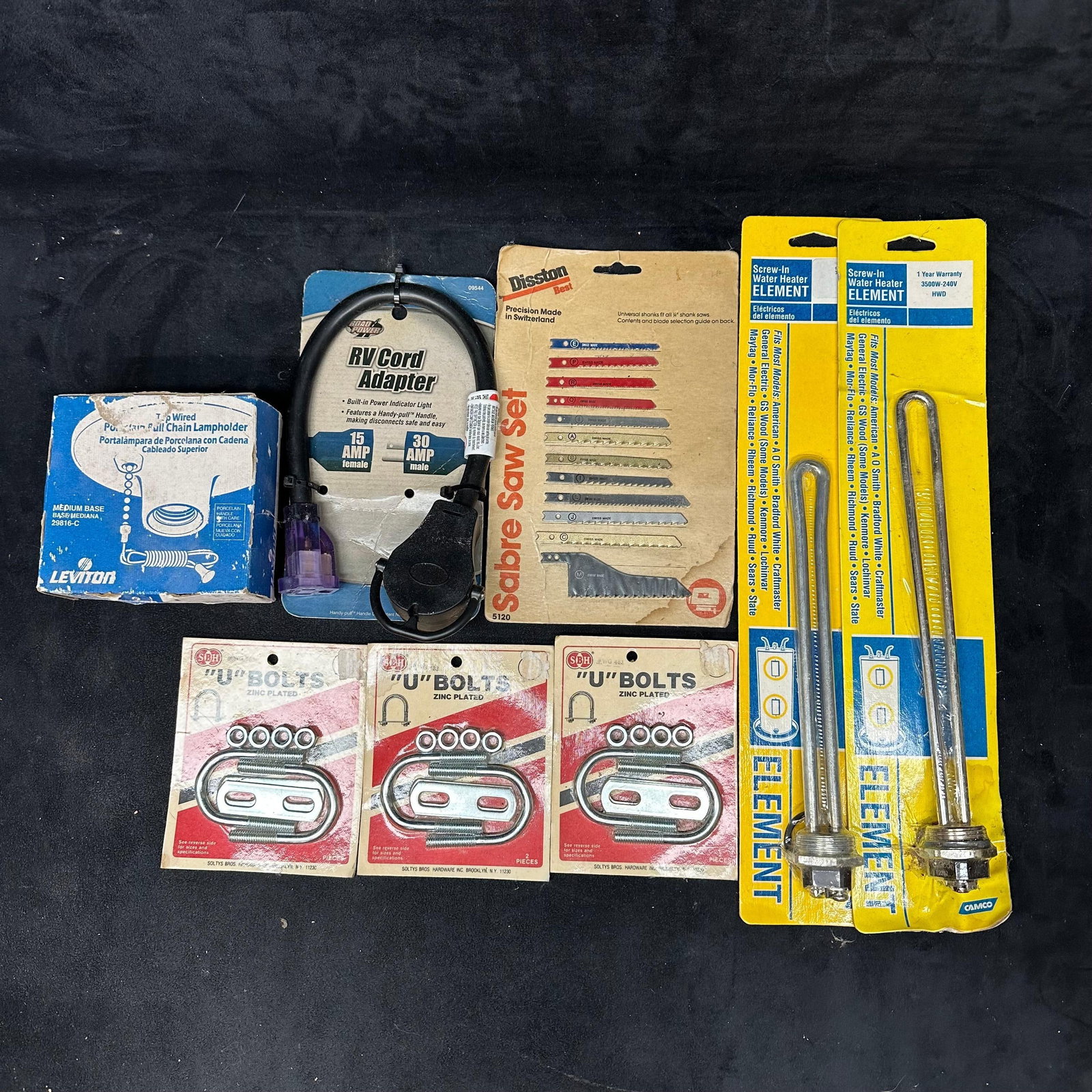 Garage Clean Out Lot new Sealed Tools Electrical Hardware and Accessories Set of Ten: Mixed lot of new, unused garage and workshop items. Includes sealed electrical and hardware accessories, RV power adapter, porcelain pull-chain lamp light bulb holder, screw-in water heater elements, 