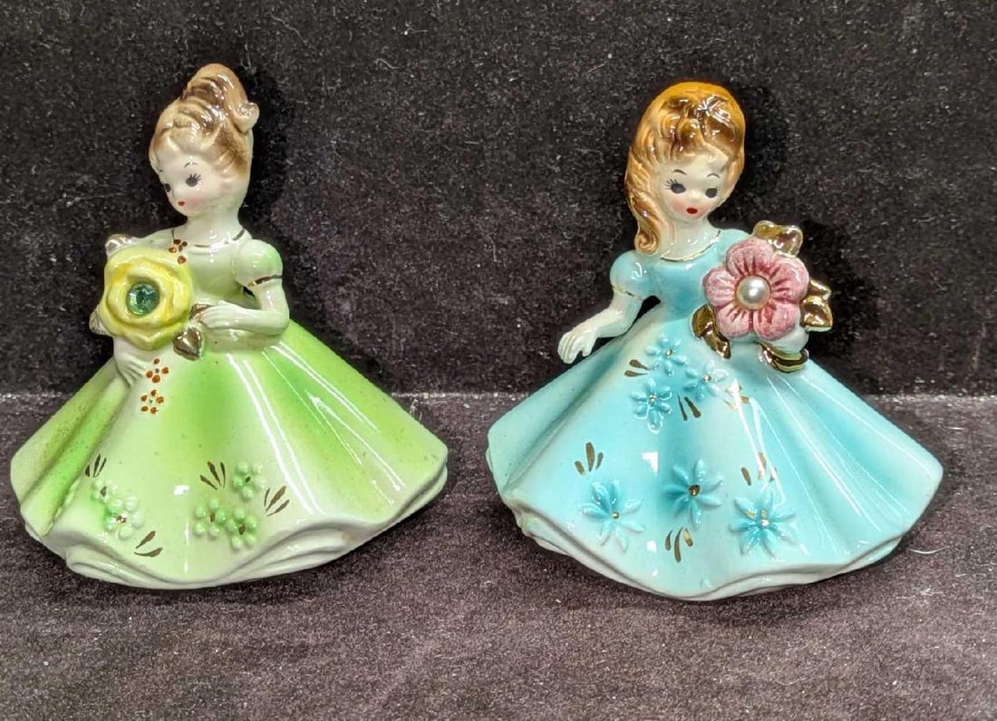2 Vintage Josef Originals Ceramic Girl Figurines August And Blue Dress: 2 Vintage Josef Originals Ceramic Girl Figurines August And Blue Dress. This lot includes: (1) August Birthday Girl. This is approx 4 1/4" x 3 5/8" x 3 1/4". (1) Blue Dress Girl.