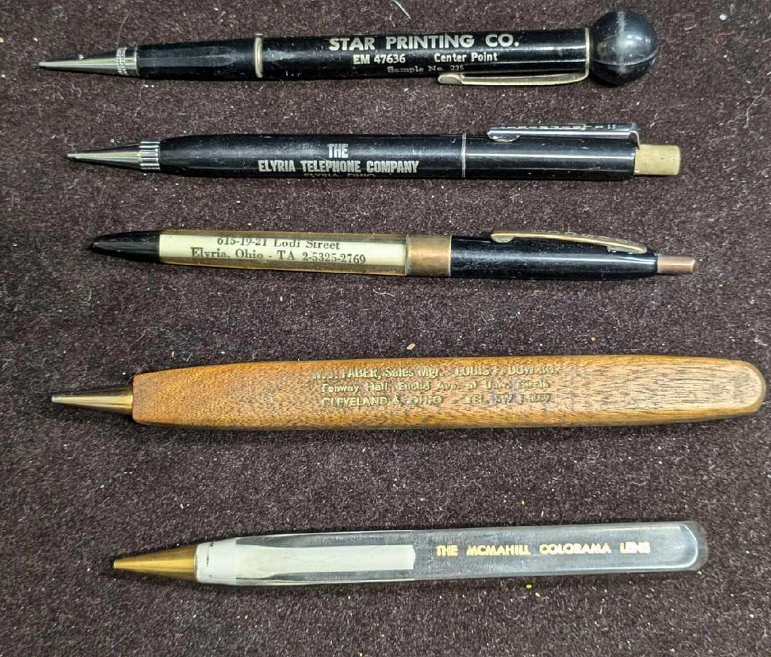 Vintage Company Mechanical Pencils & Pens: Vintage Company Mechanical Pencils & Pens. This lot contains: (1) Perkings Motor Service. This is approx 5 1/4" x 1/4" x 1/4". Pen. Does not have ink. (1) Elyria Telephone Company.