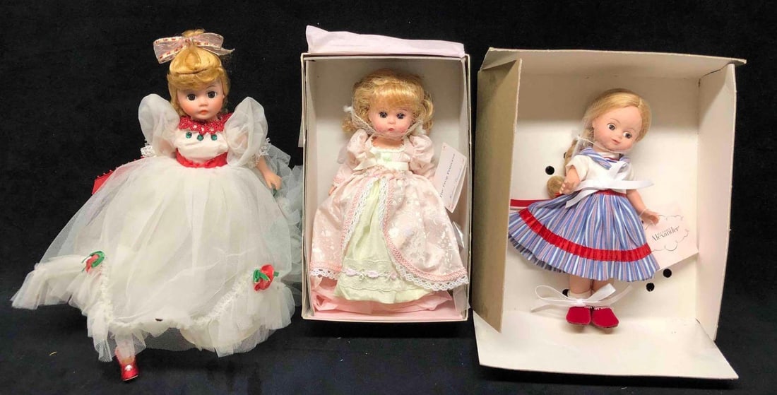 3 Madame Alexander Dolls Holly, The Frog Princess, & Little Sailor Girl: This lot contains 3 Madame Alexander Dolls Holly, The Frog Princess, & Little Sailor Girl. Information for each doll is listed below. (1) Holly. The doll comes in its original box that is approx 8