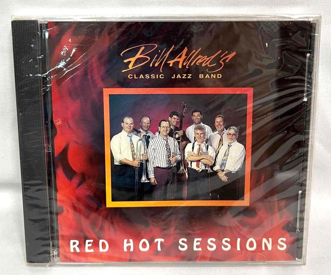 Sealed Red Hot Sessions Bill Allred's Classic Jazz Band CD 1994: This lot contains Sealed Red Hot Sessions Bill Allred's Classic Jazz Band CD 1994. It is approx 5" x 5 3/4" and it weighs about 0.2lbs. Overall the Cd is in good used condition as it does not app