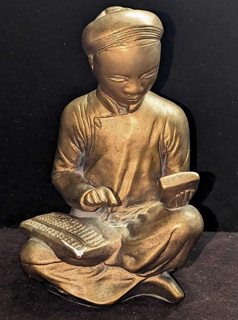Vintage Austin Pro Mathematician Scribe Figurine: Vintage Austin Pro Mathematician Scribe Figurine. This is approx 5 1/2" x 4 1/2" x 9" and it weighs 3.97lbs. Made of a cast Durastone. There is a chip on the abacus and it appears to be some