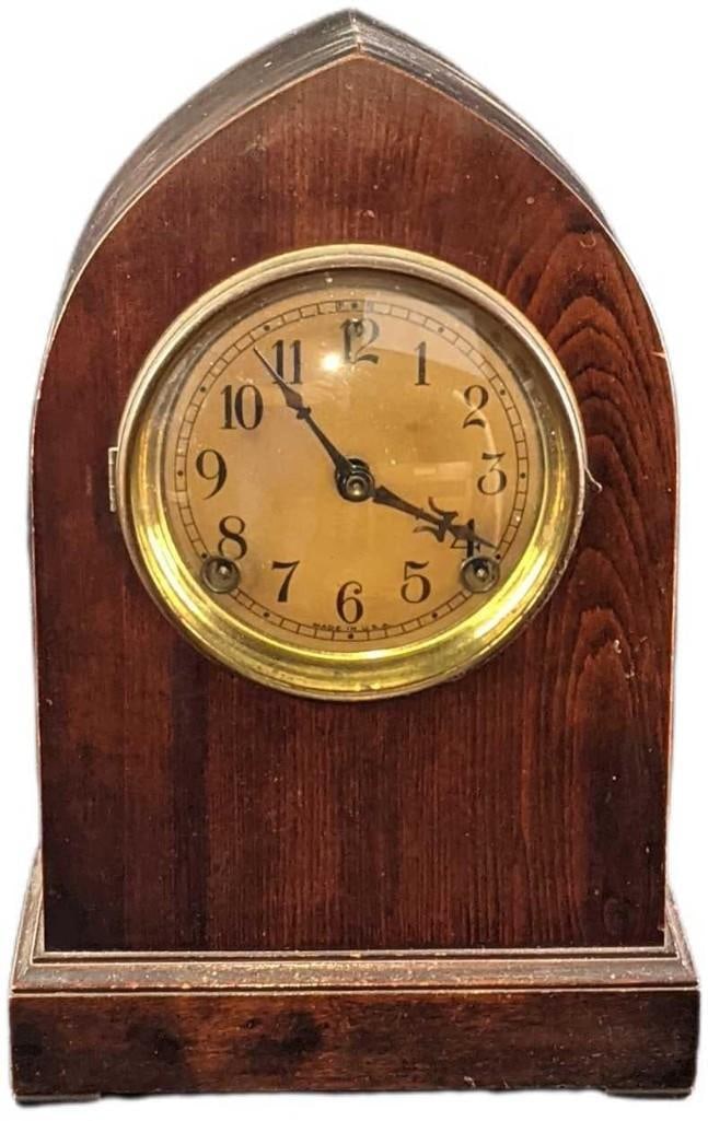 Vintage Sessions 8 Day Cathedral Mantel Clock: Vintage Sessions 8 Day Cathedral Mantel Clock. The clock is approx 9" x 4 1/2" x 13" and it weighs 5.5lbs. The clock is in a good, vintage condition with wear and cracks. The clock was tested and