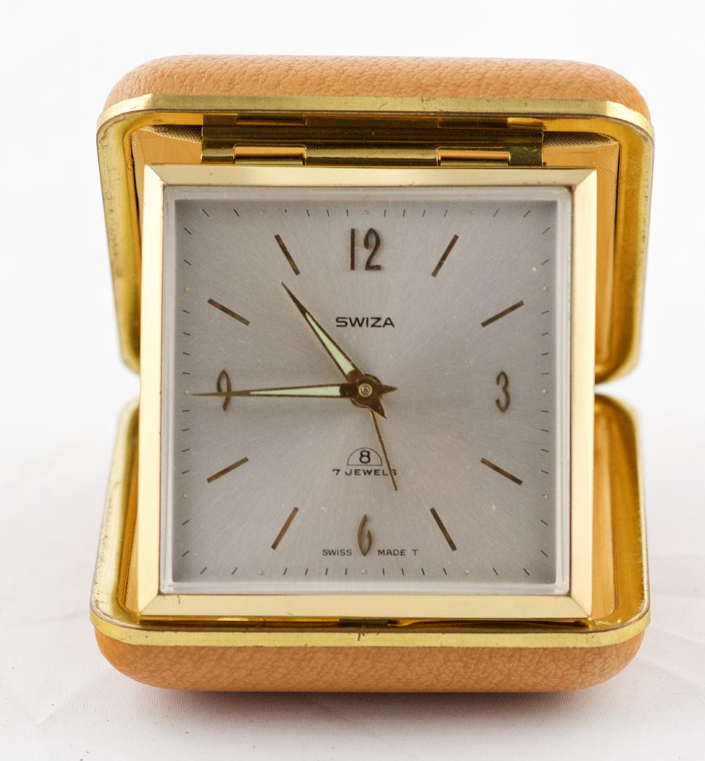 A travel clock Swiza 7 jewels 8 day, int it,s original (1 of 3)