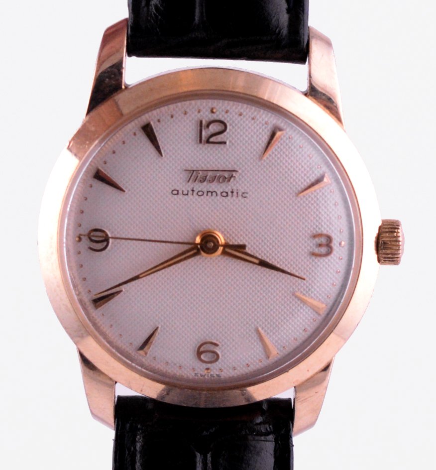 Vintage Tissot Automatic Waffle Dial Watch Circa 1950s: Striking Tissot watch from the fifteens, back when the company was at the top of their game!Seldom found in this condition, the Automatic Tissot up for auction ticks all the right boxes for a collecto