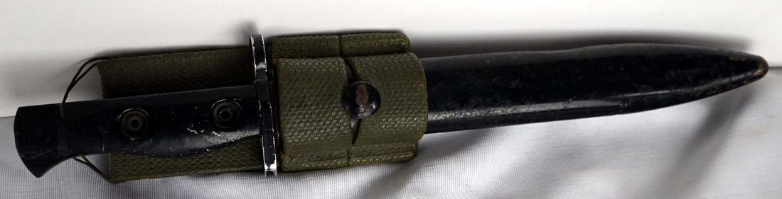 Canadian FN C1 bayonet - 1957: Canadian FN C1 bayonet (1957) Description: Canadian FN C1 bayonet marked A1957, original sheath and strap Dimension (PO): Lame 8", total 10" Dimension (CM): Lame 20.32 cm, total 25.40 cm Co