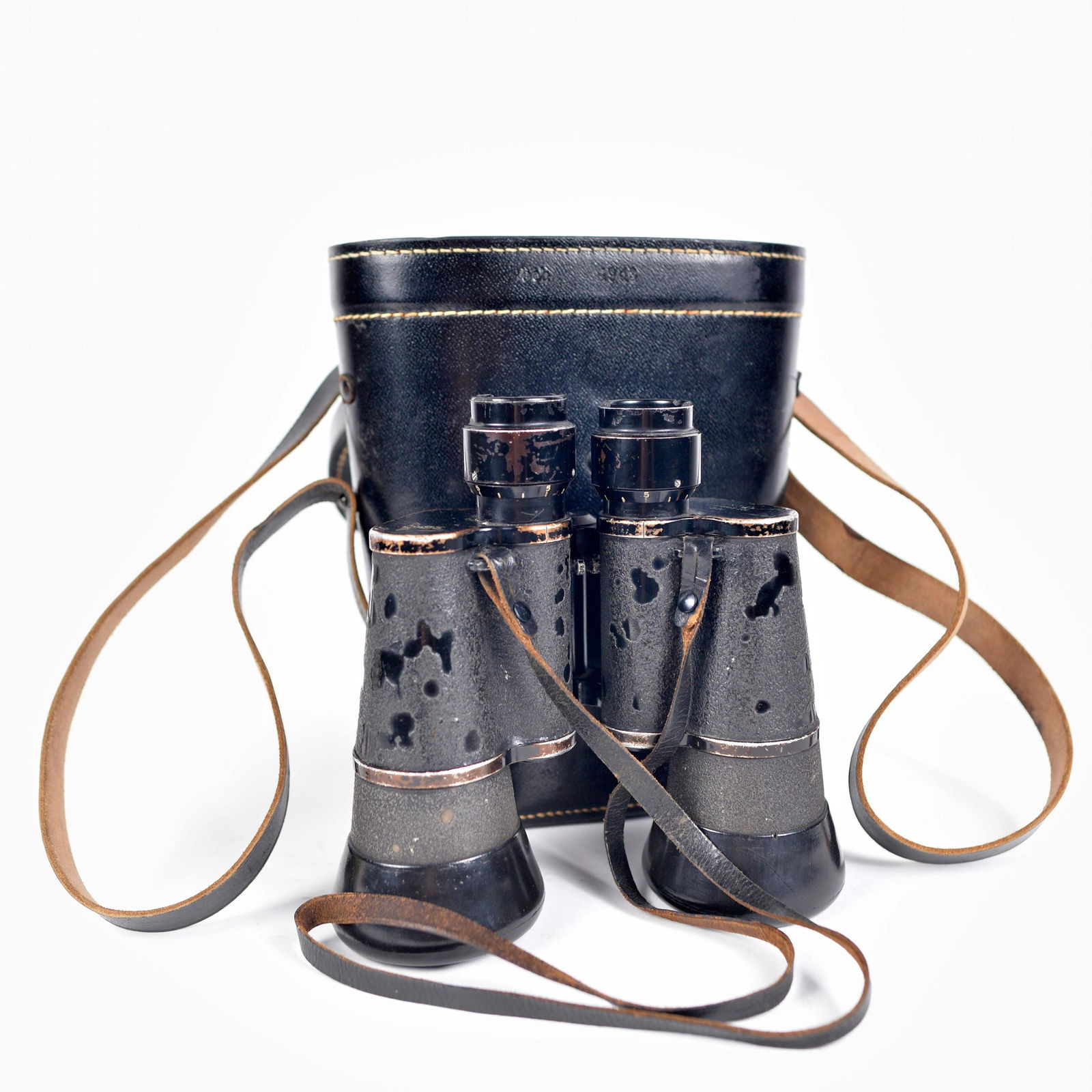 Pair of World War II military binoculars - 1943: Pair of World War II military binoculars (1943) Description: Marked 7x50, 2149178 blc (Carl Zeiss Jena) with nazi eagle surmounting an M, original leather case marked beh 1943 Dimension (PO): 7 1/2" x