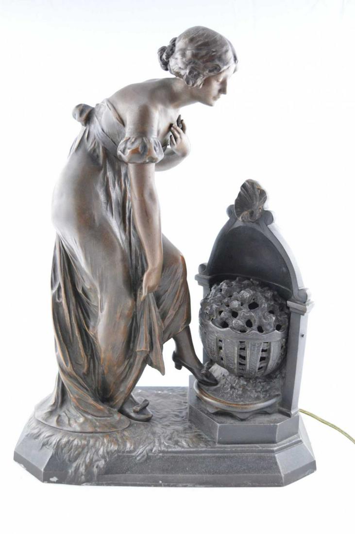 Caussé, Julien - Woman and brazier lamp: Caussé, Julien (1869â€“1914 ) Woman and brazier lamp Description: Figurative lamp in bronze with brown patina, signed behind J. Caussé and stamped Made in France Dimension (PO): 12"