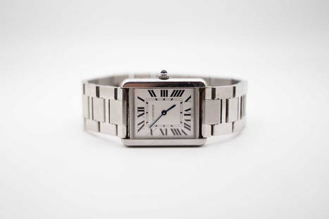 Cartier - Tank Solo quartz watch: Cartier Tank Solo quartz watch Description: Steel bracelet, with box and papers Condition report: Used condition, damaged box latch