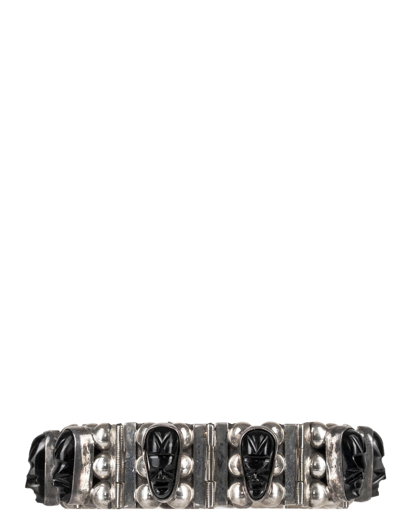 Silver bracelet adorned with stones: Mexico Bracelet en argent orné de pierres Argent sterling 925 orné de 10 pierres noir sculptées pesant 44.7gr Dimension: 10" diametre x 3/8 Large 25.4cm diameter x 0.96cm Large 