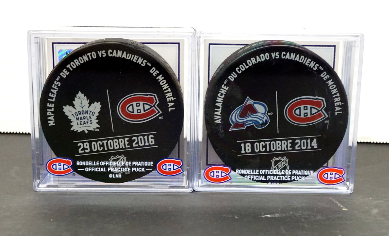 Hockey - Official Practice Hockey Pucks: Hockey Rondelles officielle de Pratique 2 rondelles de pratique Maple Leafs contre le Canadiens et Avalanche du Colorado contre le Canadiens...avec Certificat d'authenticité Rapport de
