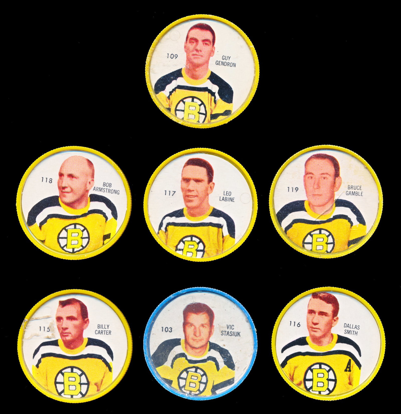Shiriff - 1960-61 Boston Shiriff-Bruins hockey tokens: Shiriff 1960-61 Jetons de hockey Shiriff-Bruins de Boston Serie partielle incluant les numéros 103-109-115-116-117-118-119 7 jetons au total Rapport de condition: Bonne condition