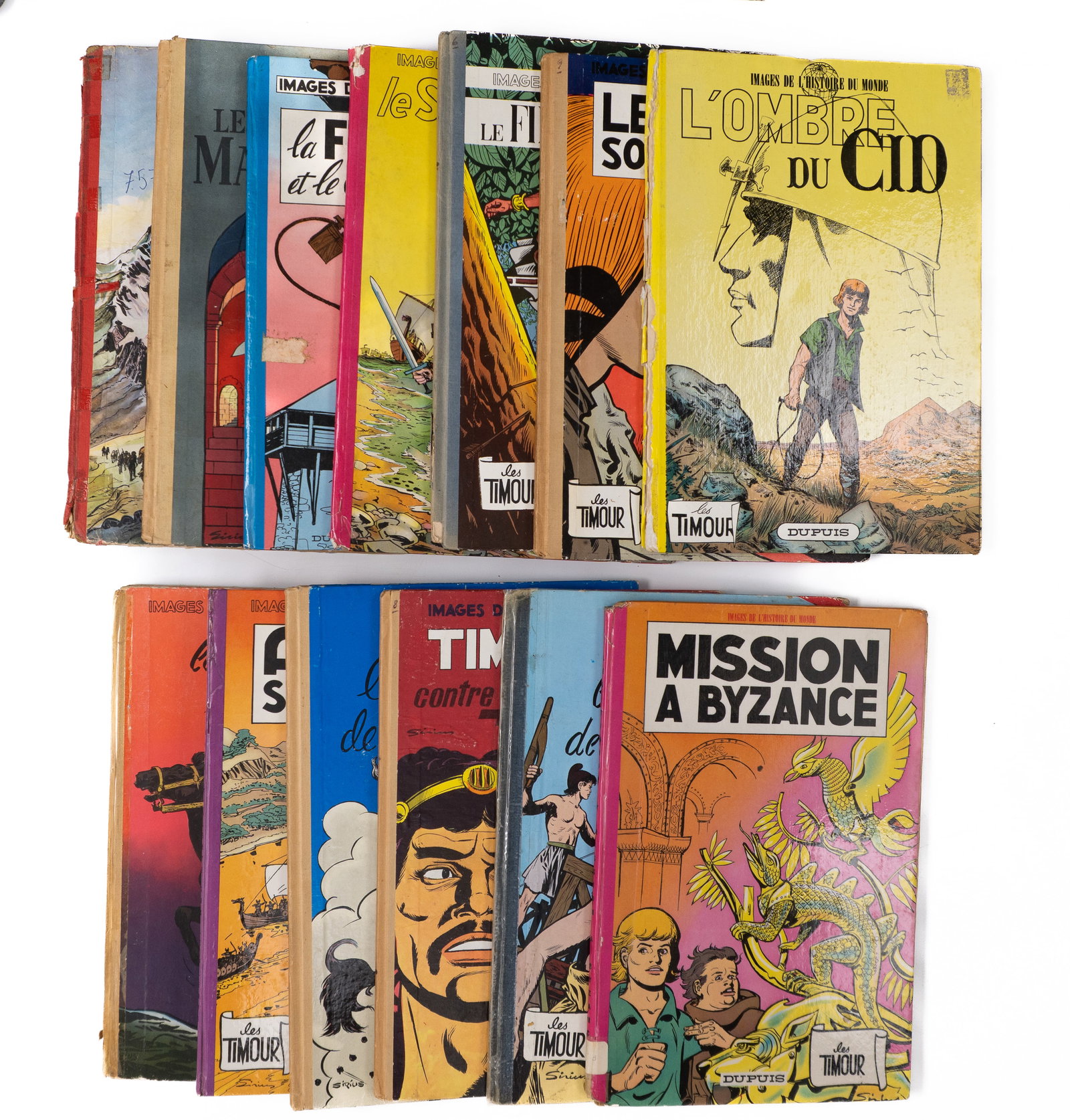 Mayeu, Max dit Sirius \ Snoeck, Xavier - Lot of comic strips Les Timour - 1955-1965: Mayeu, Max dit Sirius \ Snoeck, Xavier (1911-1997 \ 1920-1970) Belgique \ Belgium Lot de bandes dessinées Les Timour (1955-1965) 14 albums en édition originale Dimension: 12" x 8" 30.5 x 20.