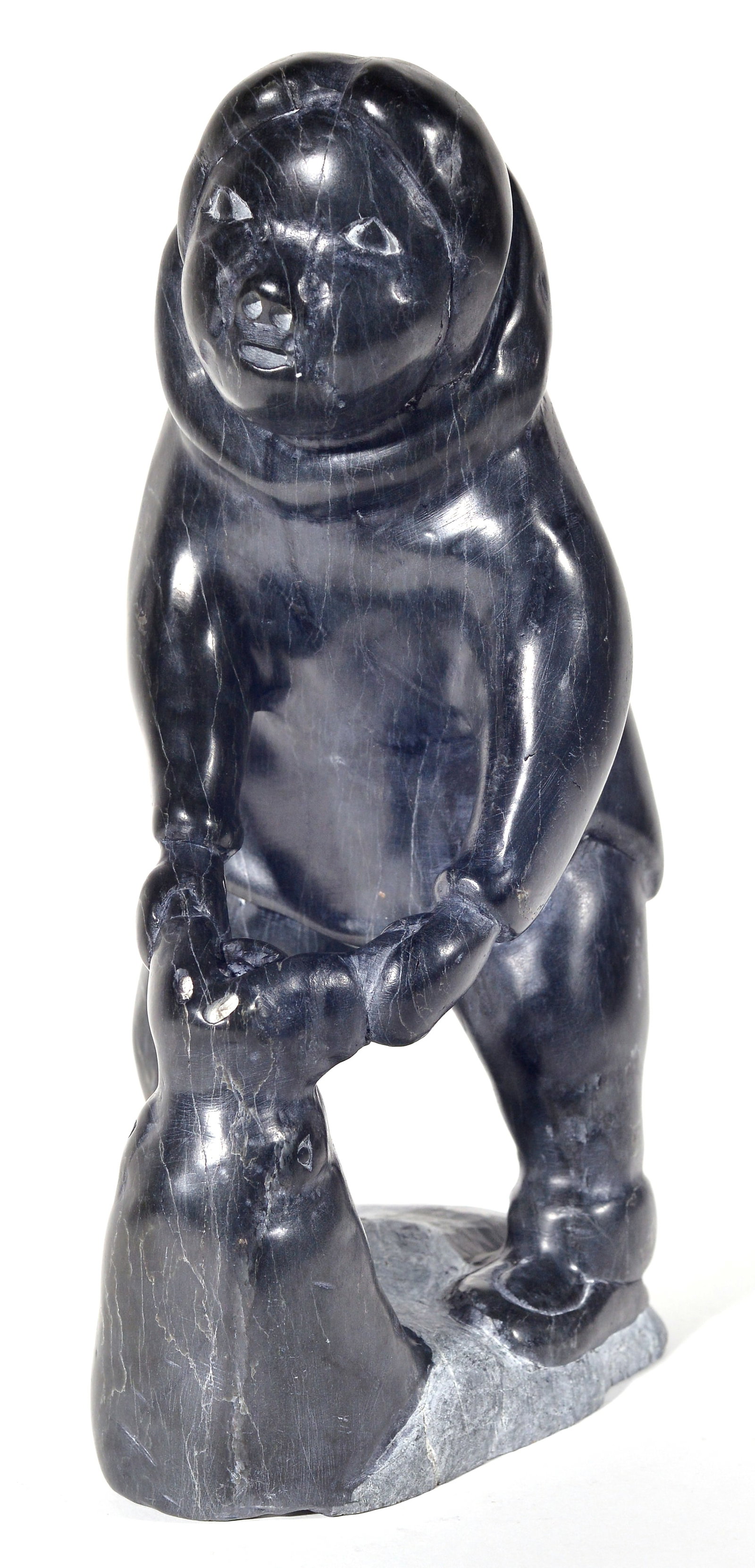Ishulutaq, Lasaloosie - Woman and seal: Ishulutaq, Lasaloosie (1948-) Pangnirtung Femme et phoque Pierre, signée en syllabique, numérotée 5-102402 Dimension: 13 1/4" x 8 1/4" x 4 1/4" 33.7 x 21.0 x 10.8 cm -------------