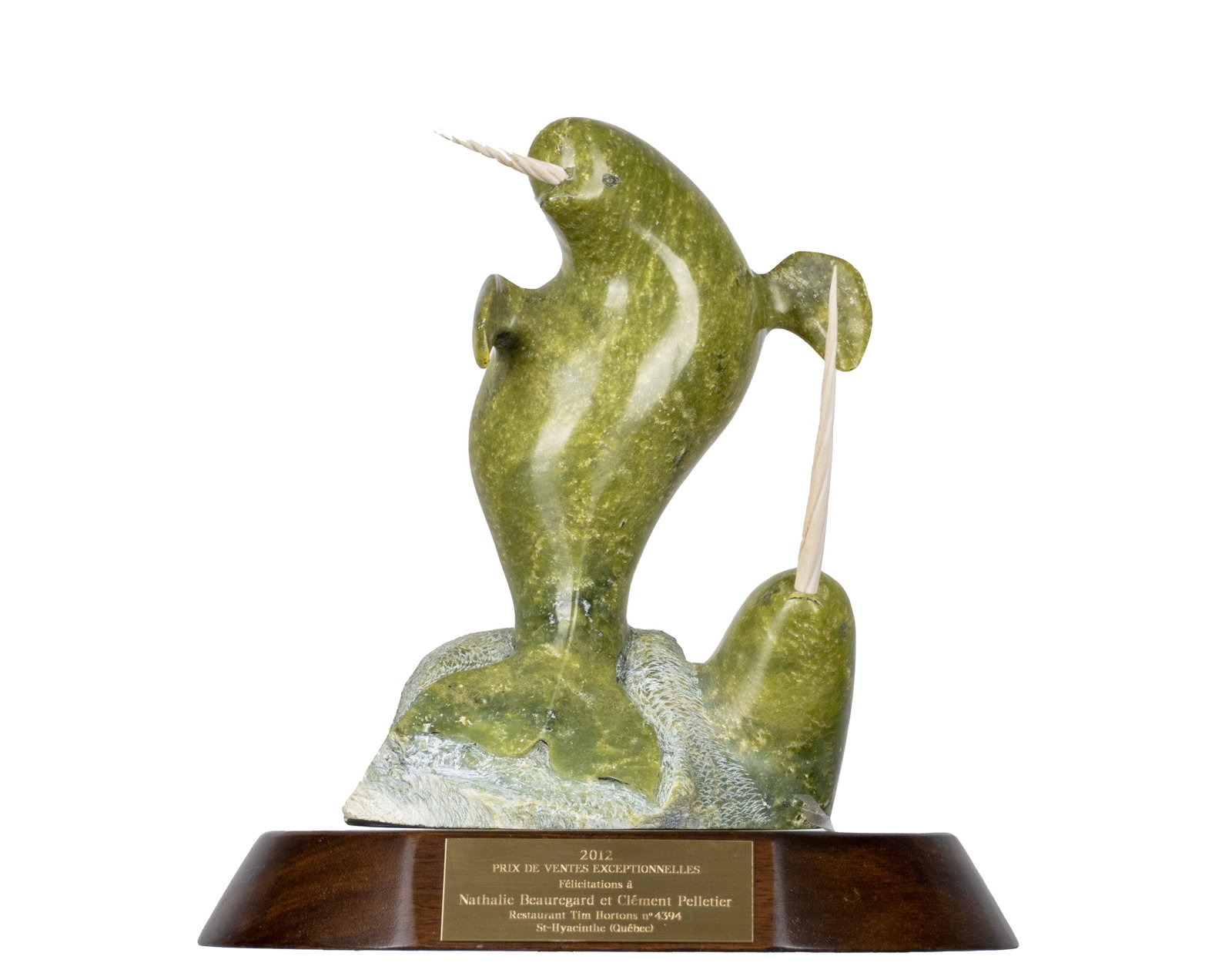 Qimirpik, Suati - Narwhal - 2012: Qimirpik, Suati (1996-) Narwhal (2012) Description: Inuk serpentinite sculpture on a wooden base, numbered 836017944, certified by the Government of Canada. Place of origin: Kimmirut. Dimension (PO):