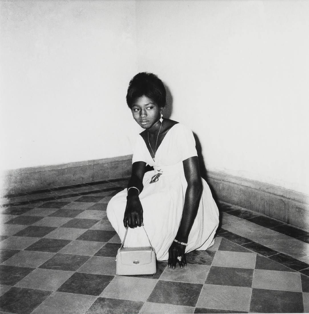 Malick Sidibé - Avec Mon Sac, Bagues et Bracelets: Lot 47 Malick Sidibé Malian (1935-2016) Avec Mon Sac, Bagues et Bracelets (1968/1998) gelatin silver print signed and dated (printed 1998) image: 16 x 16 1/4 inches sheet: 23 1/2 x 19 1/2 inches $250