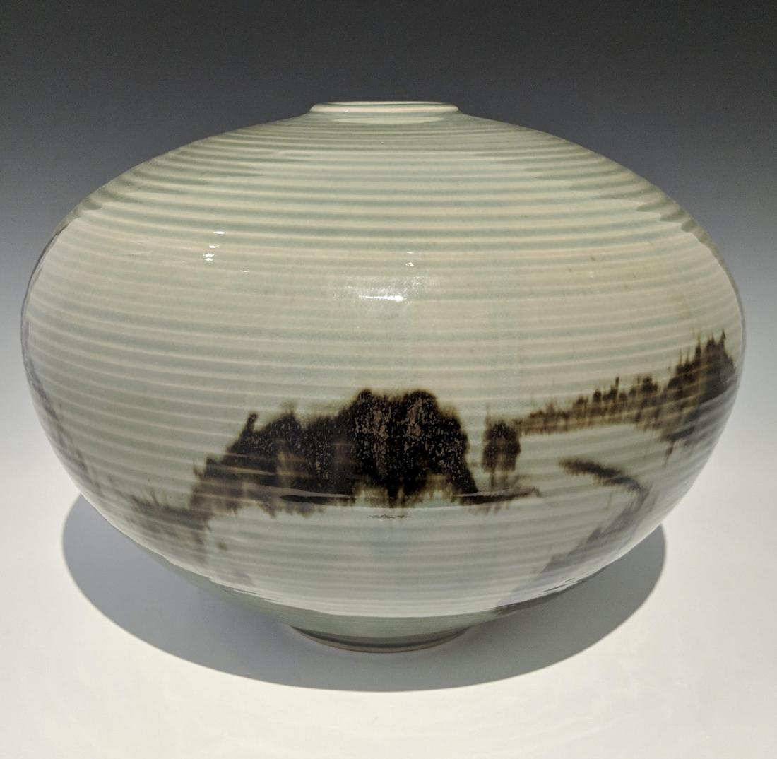 Otto and Vivika Heino - Vessel: Lot 112 Otto and Vivika Heino - Vessel American (20th century) Vessel (1991) porcelain with celadon glaze with tenmoku brushwork signed on bottom 9 x 10 1/2 inches Provenance: from the Collection of A
