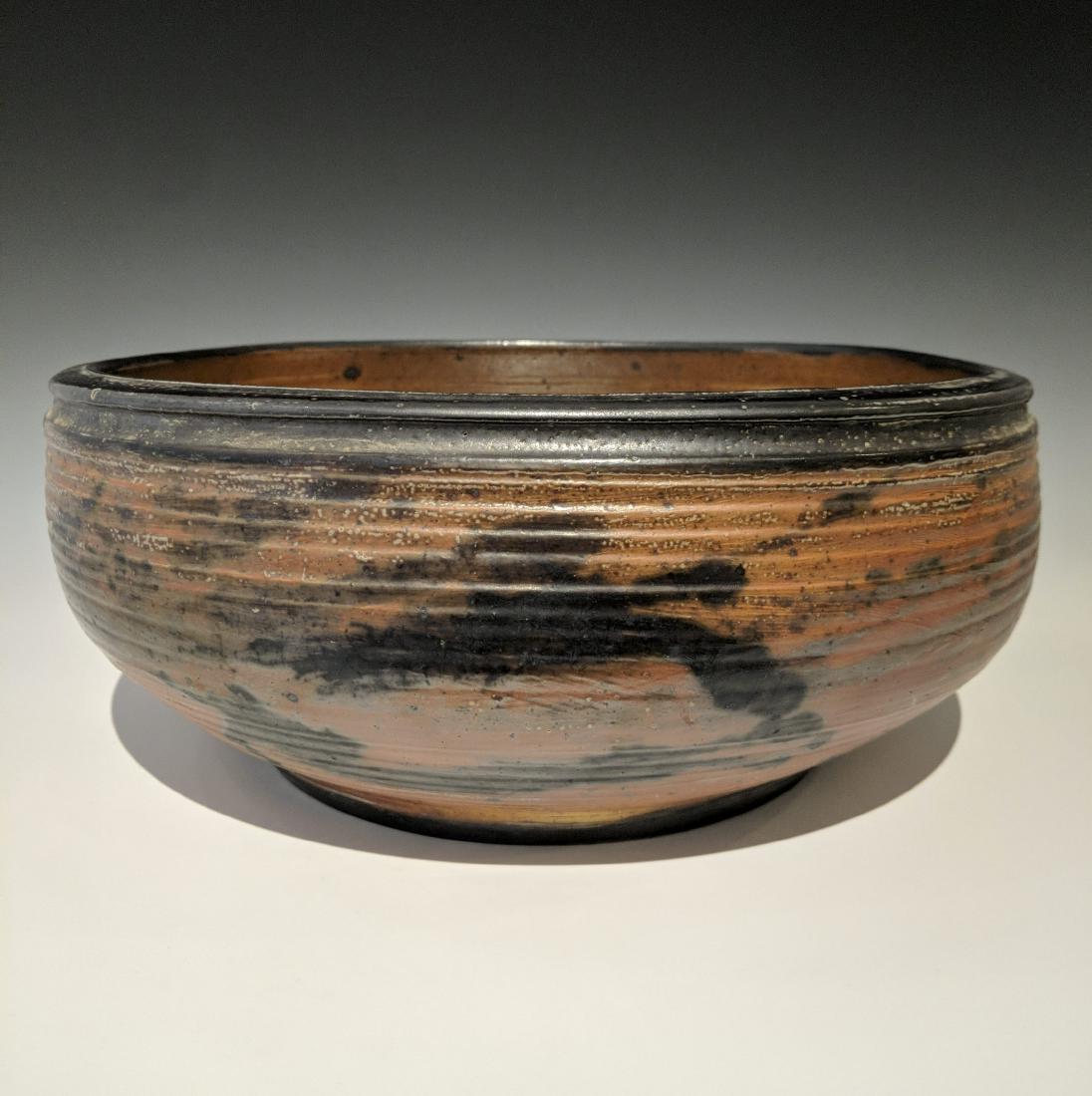 Otto and Vivika Heino - Shallow bowl: Lot 113 Otto and Vivika Heino - Shallow bowl American (20th century) Shallow bowl (1991) wood fired white clay body with salt glaze signed on bottom 6 x 13 inches Provenance: from the Collection of Ar