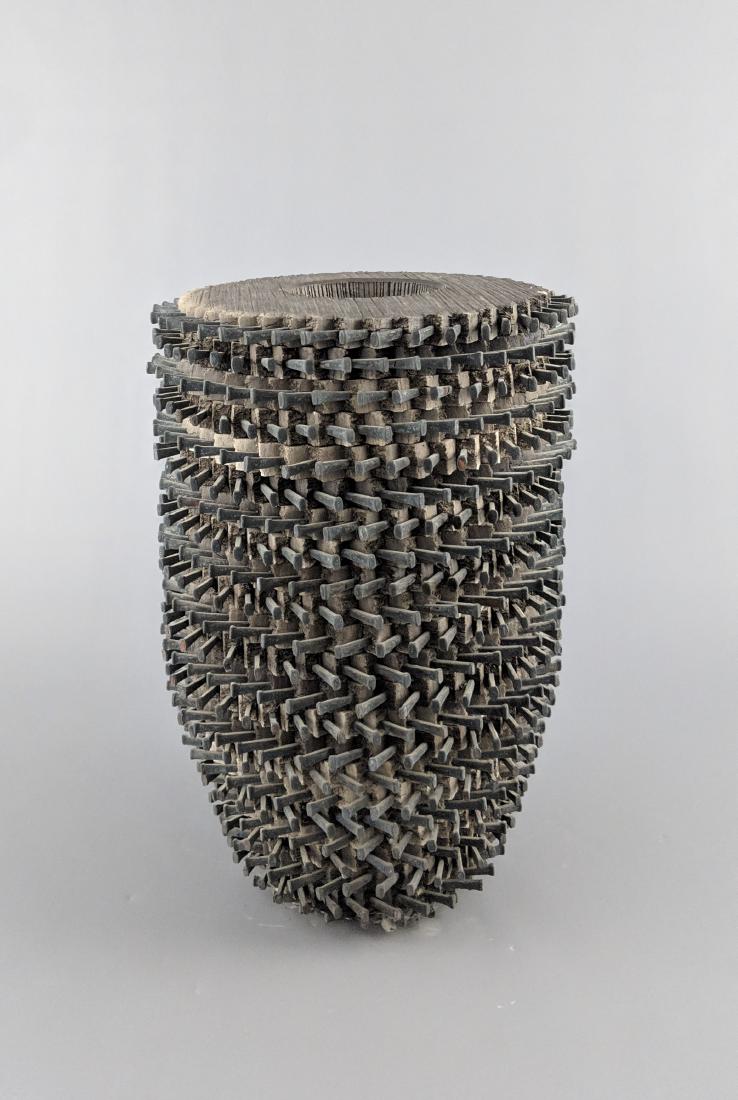 Rob Sieminski - Tall double walled vessel with nails: Lot 165 Rob Sieminski - Tall double walled vessel with nails American (b.1953) Tall double walled vessel with nails earthenware and nails artist stamp on bottom 16 1/2 x 11 inches Provenance: from th