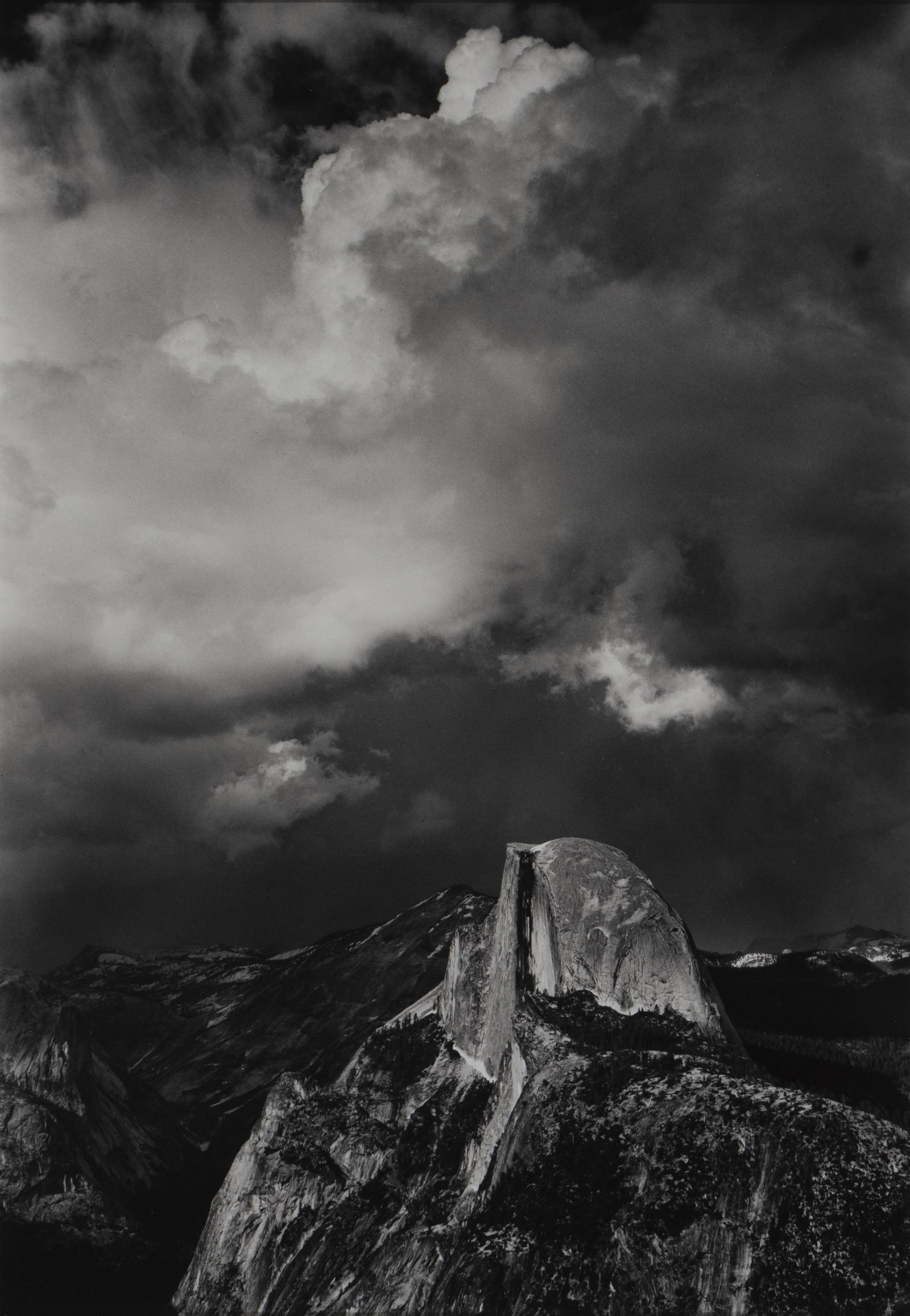 Ansel Adams - Half Dome from Glacier Point,: Lot 88 Ansel Adams American (1902-1984) Half Dome from Glacier Point, Thunderstrom (1994) gelatin silver print stamped verso printed by Alan Ross 9 1/8 x 6 3/8 inches Provenance: from the Giacomett