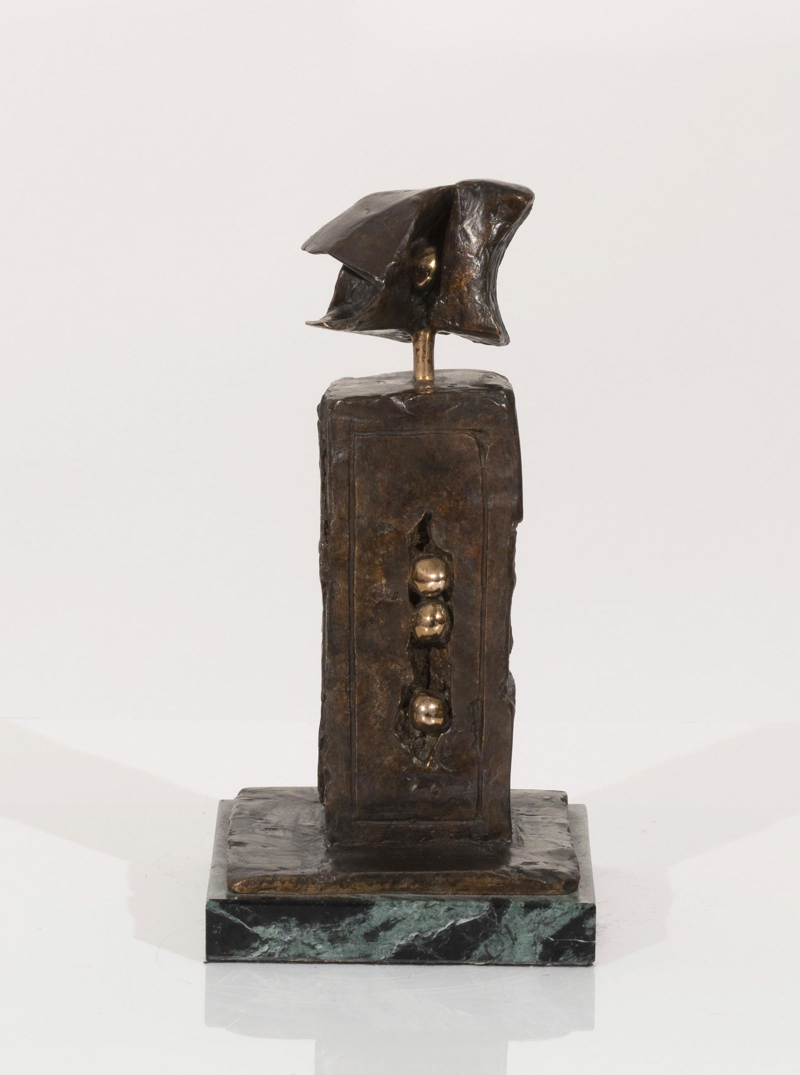 James Coignard - Personnage: Lot 82 James Coignard French (1925-2008) Personnage bronze on marble plinth signature incised on the base, numbered 23/24, stamped with foundry mark overall: 5 1/4 x 5 1/4 x 10 1/2 inches Provenance: