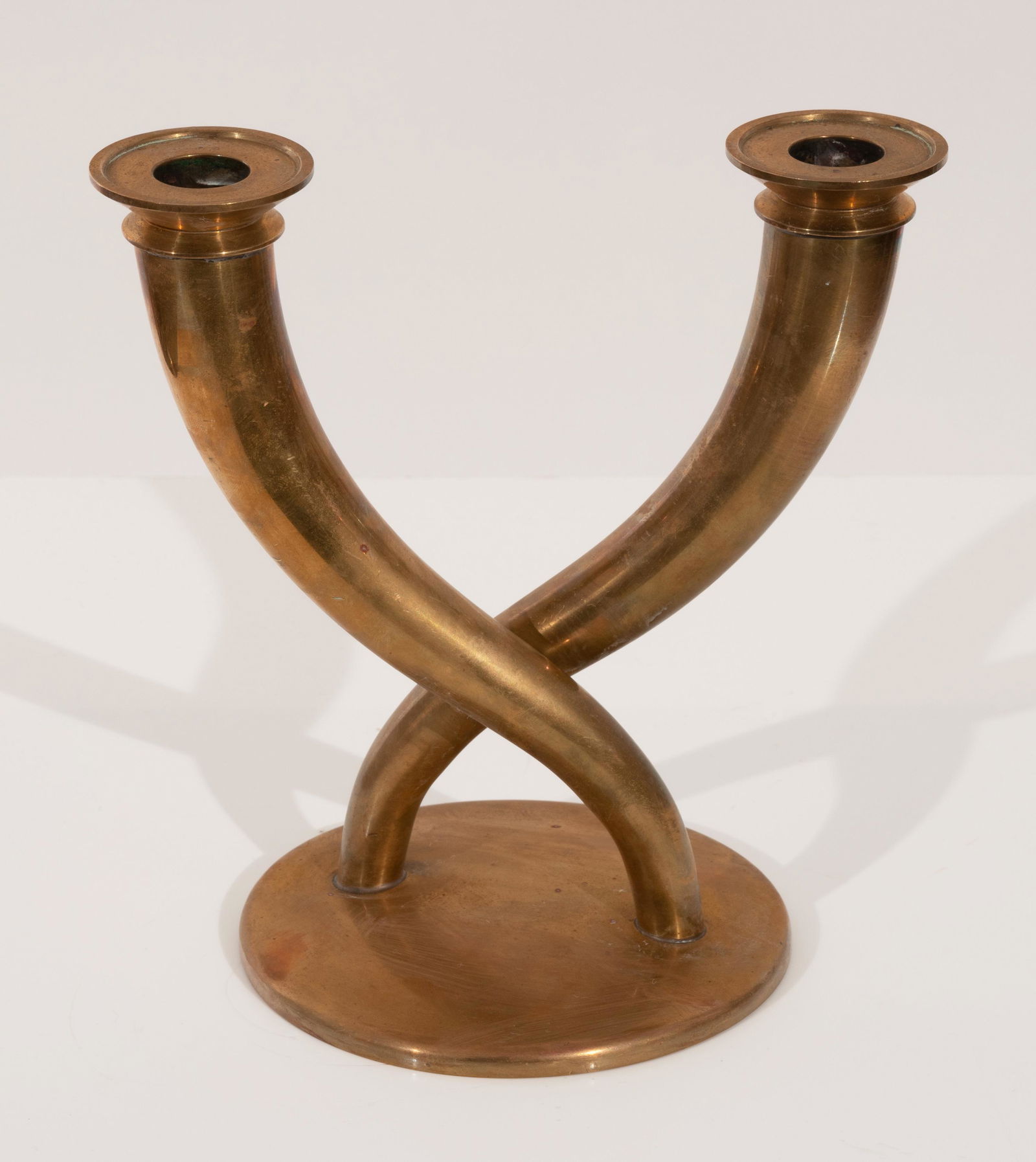 Gio Ponti - Double candle holder: Lot 225 Gio Ponti Italian (1891-1979) Double candle holder brass overall height: 8 1/4 inches