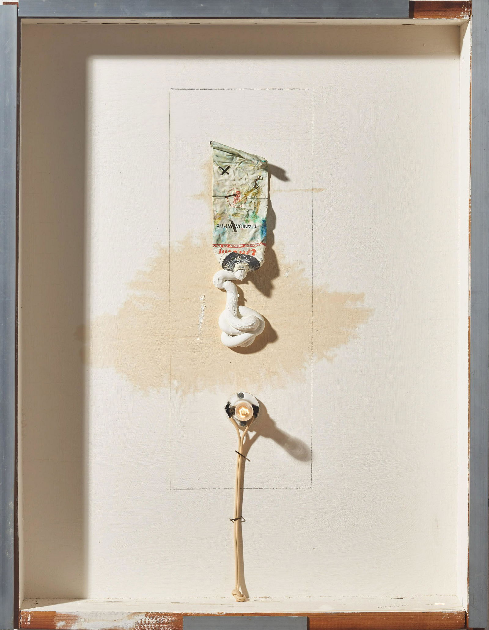 Dan Basen - White Tube of Paint with Light: Lot 74 Dan Basen American (1939-1970) White Tube of Paint with Light (1964) mixed media in artists frame signed lower right Provenance: from the collection of Allan Stone Gallery The Artist,Allan
