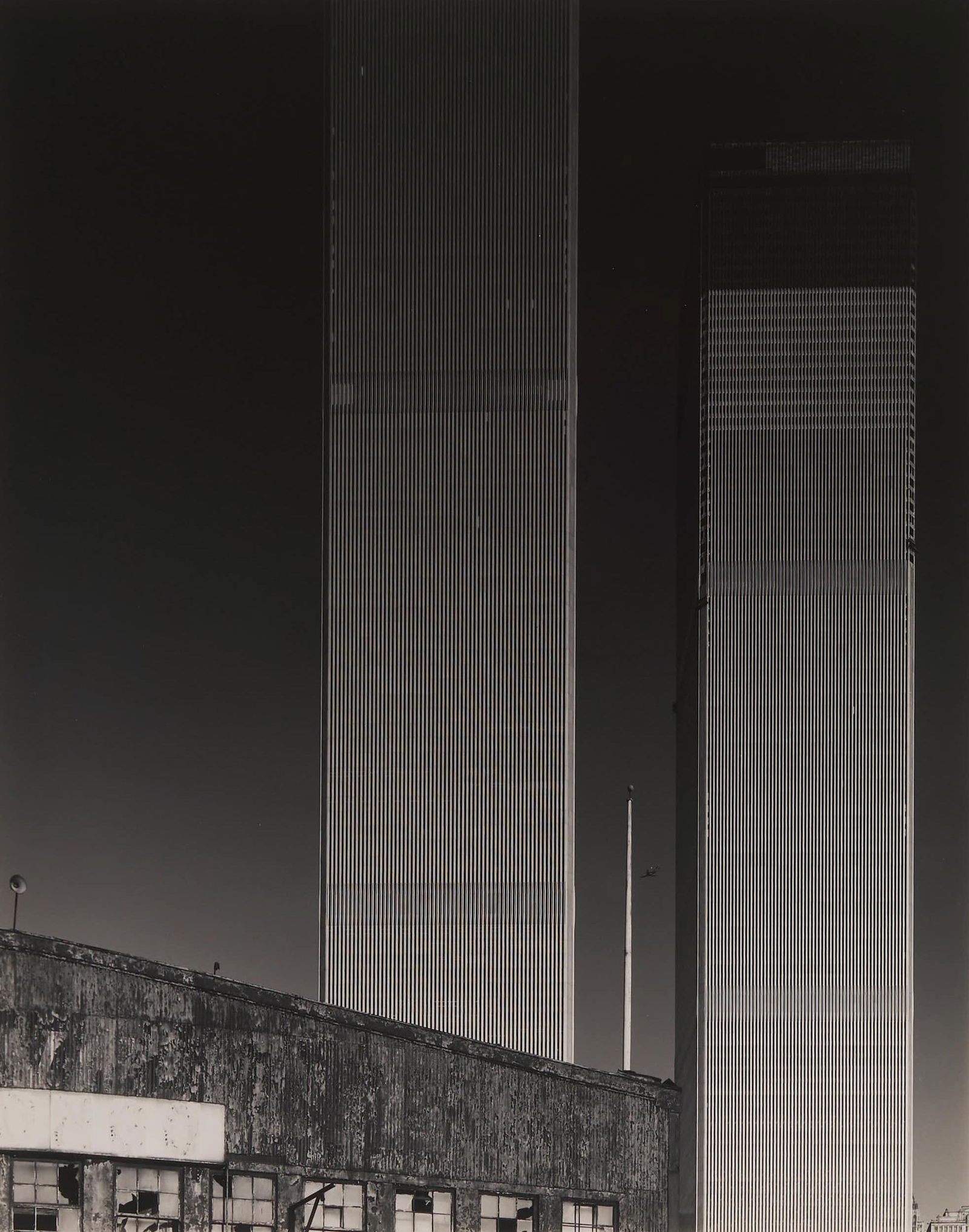Todd Watts - World Trade Center #3 & #5: Lot 7 Todd Watts American (b. 1949) World Trade Center #3 & #5 (1972) gelatin silver print laid down on paper each signed lower right, numbered 4/100 image (each): 13 1/2 x 10 3/4 inches Provenance: f