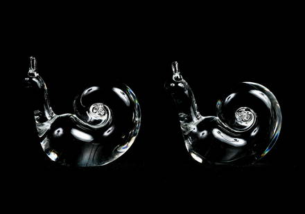 Steuben Glass - Two snails: Lot 2 Steuben Glass American (20th Century) Two snails crystal each inscribed on the bottom 3 x 3 1/4 x 1 inches Provenance: from a private Alpine, New Jersey collection