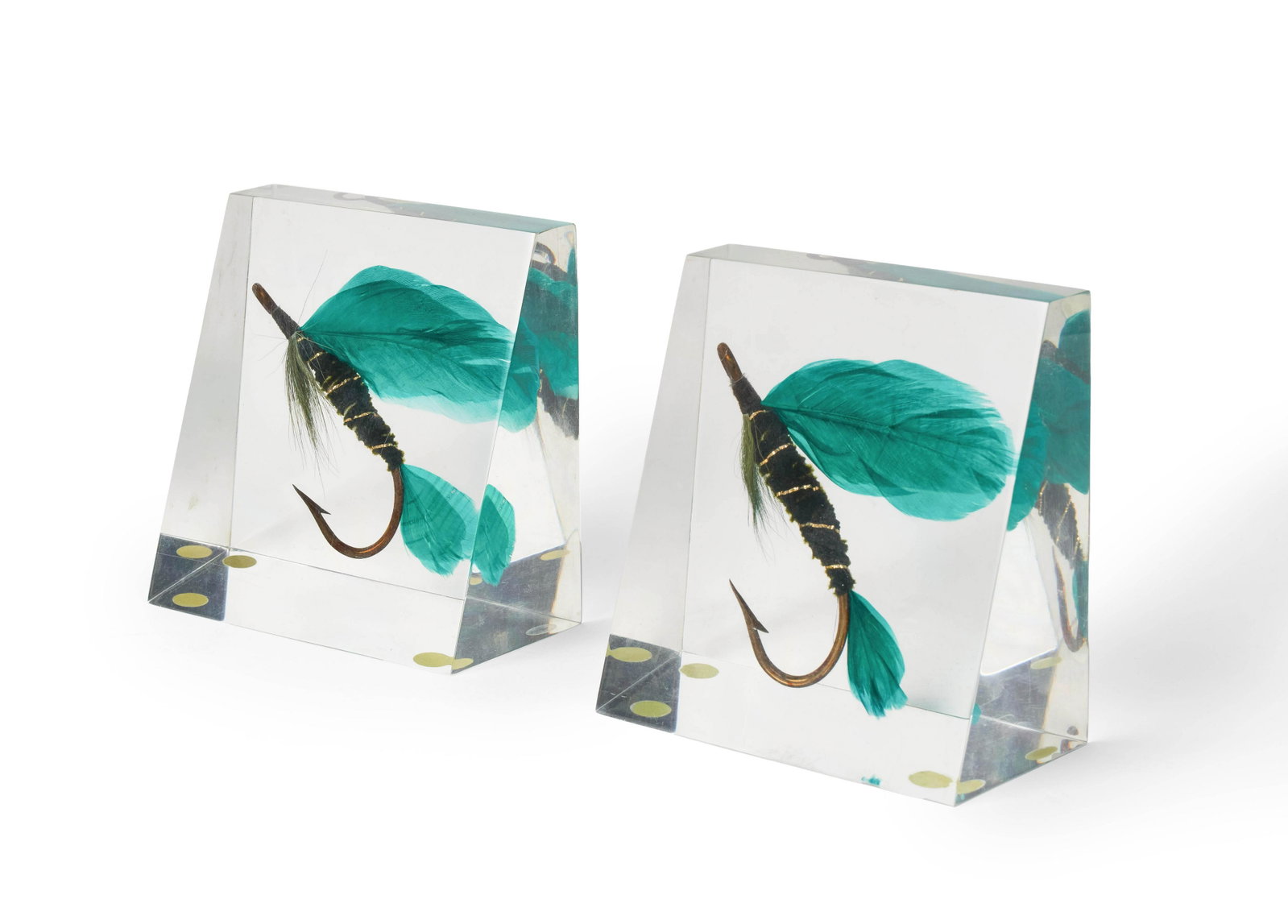 Unknown Artist - Lucite fishing lure Bookends: Lot 52 Unknown Artist (XX/XXI) Lucite fishing lure Bookends feather fishing lure in lucite block each: 4 3/4 x 2 1/4 x 4 5/8 inches Provenance: from a private Alpine, New Jersey collection