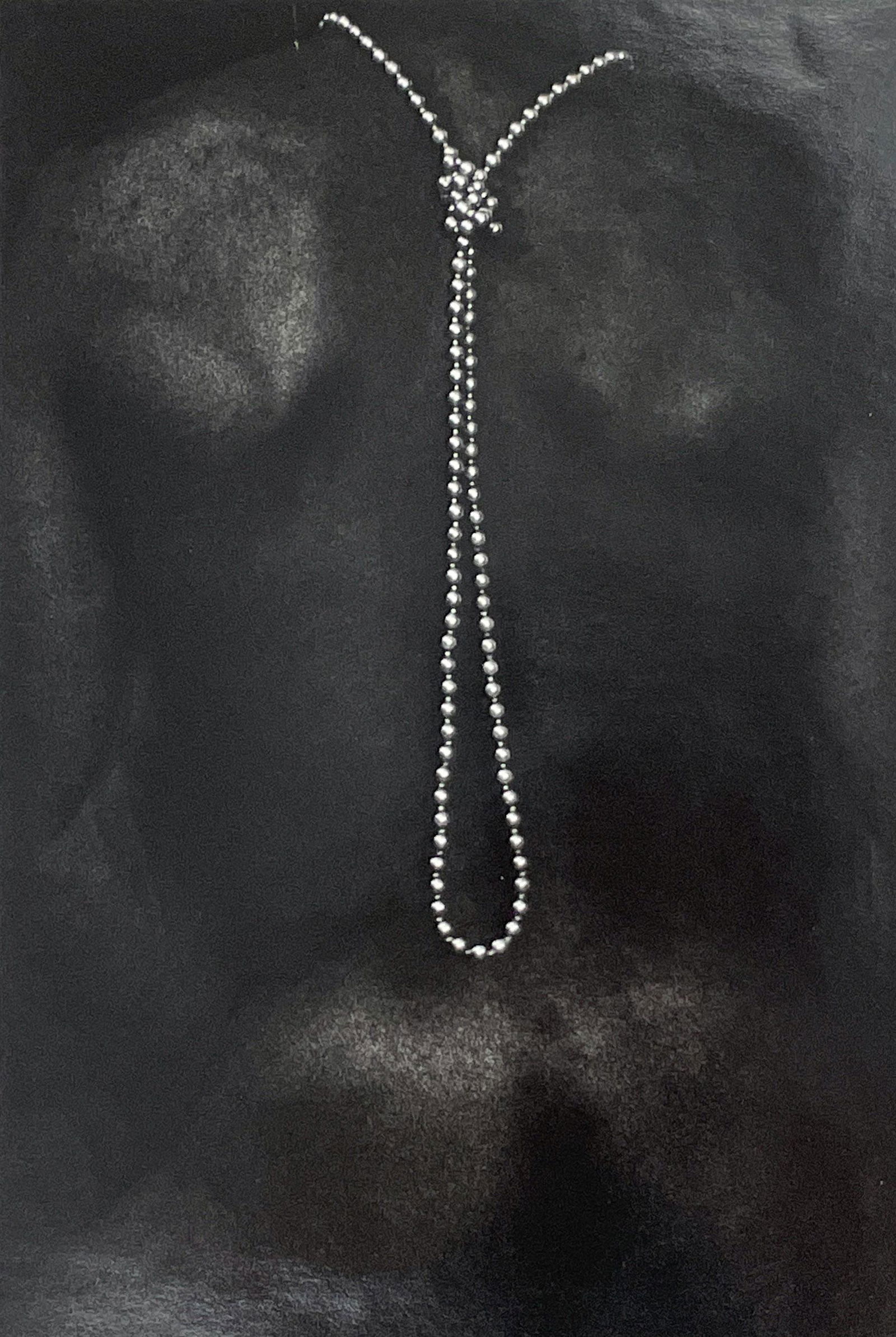 René Peña- Sin Titulo: Lot 21 René PeñaCuban (b.1957) Sin Titulo (1995) silver gelatin print, in mat signed verso, numbered 5/15 image: 12 1/4 x 8 1/4 inches mat: 18 1/4 x 14 1/4 inches