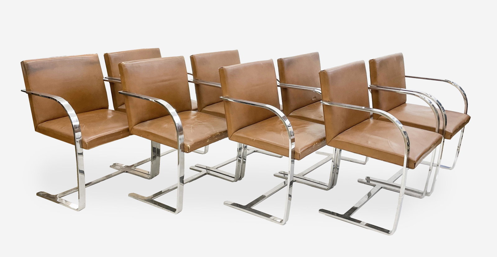 Mies Van der Rohe for Knoll, set of 8 cantilevered: Lot 56 Mies Van der Rohe for Knoll, set of 8 cantilevered brown Brno armchairs each: 32 x 23 1/4 x 22 inches Provenance: Estate of Howard A. Smith Literature: Mies van der Rohe: Furniture and Interior