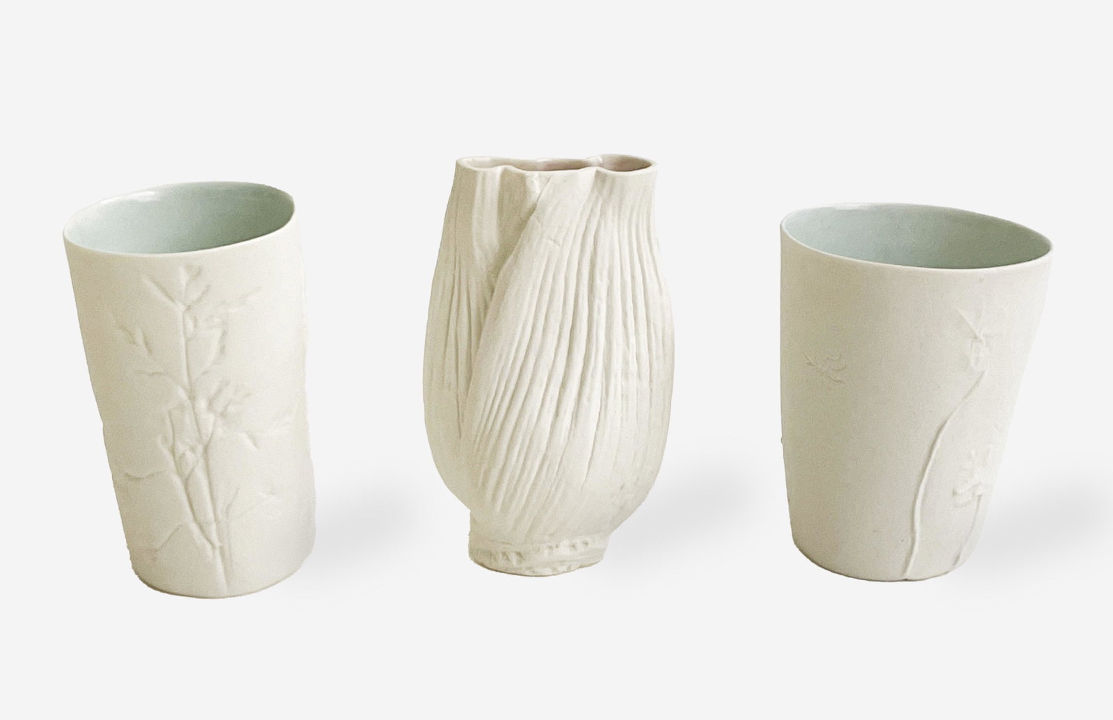 Daniel Reynolds - Two Cups and Small Fennel Vase: Lot 66 Daniel Reynolds English (b.1961) Two Cups and Small Fennel Vase (2006 & 2009) porcelain each signed on the bottom tallest: 4 x 2 x 1 inches Provenance: a private Greenwich Village collector