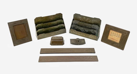 Tiffany Studios - Chinese Desk Set (8 Pieces): Lot 6 Tiffany Studios - Chinese Desk Set (8 Pieces) lot includes eight desk articles made of bronze with brown patina largest (paper rack): 8 x 12 1/8 x 3 1/2 inches Additional Information: lot inclu