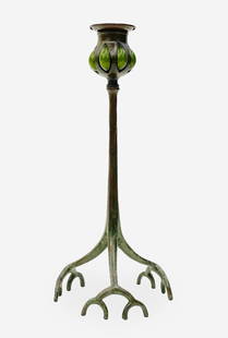 Tiffany Studios - Candlestick: Lot 22 Tiffany Studios - Candlestick Tiffany bronze candlestick, with blown-out green glass on root-form tripod legs height: 12 1/4 inches Additional Information: stamped to underside: 'Tiffany