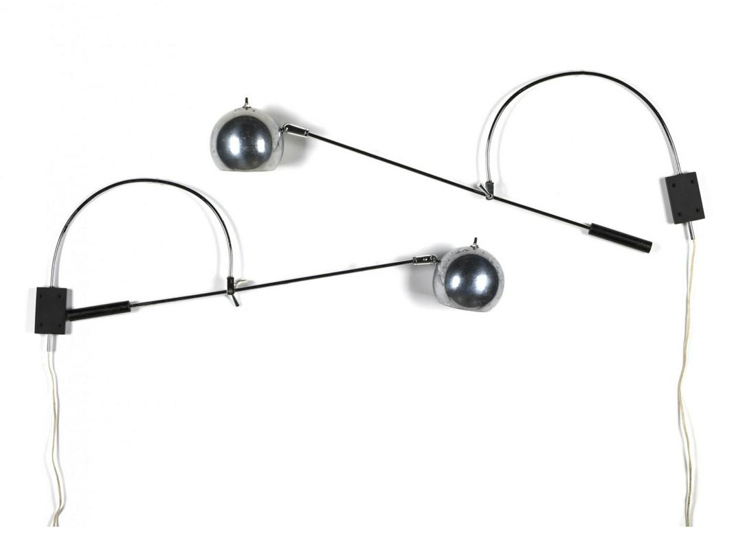 Pair of Robert Sonneman Orbiter Wall Sconces: Lot 204 Pair of Robert Sonneman Orbiter Wall Sconces chromed steel swing-arm wall sconces with ball shades each: 19 x 36 x 7 inches Provenance: Property from the estate of Joan Kessler a well regard