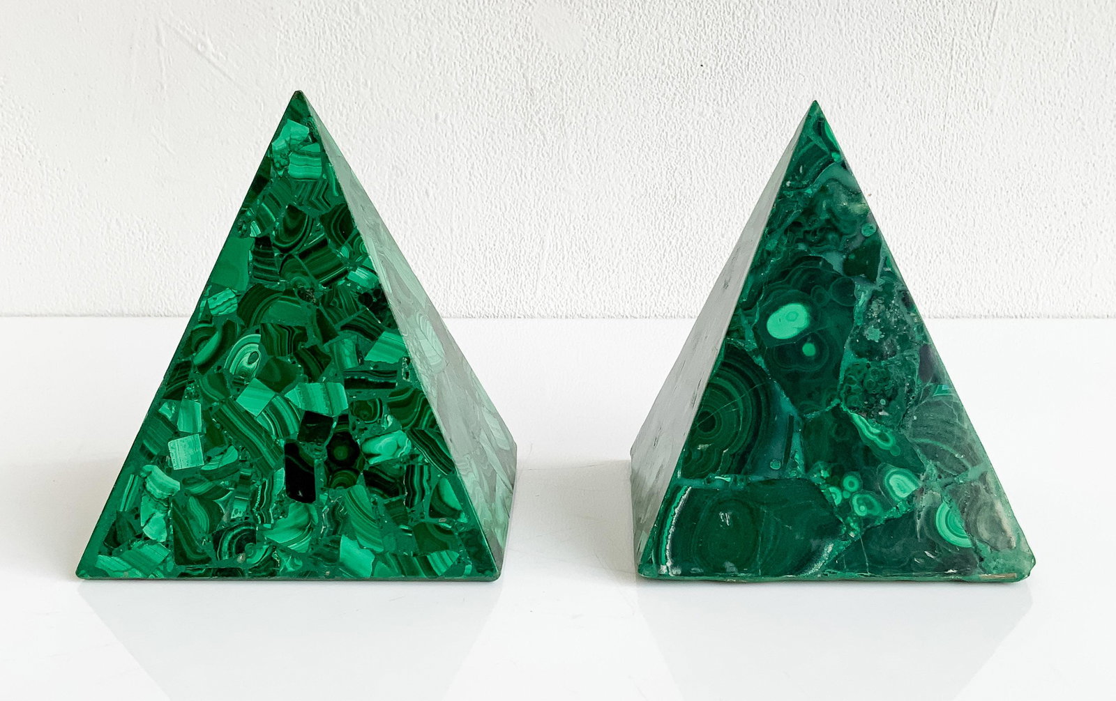 Near Pair of Malachite Veneer Pyramids: Lot 140 Near Pair of Malachite Veneer Pyramids height (larger): 5 1/2 inches Provenance: From a Private New York Collection