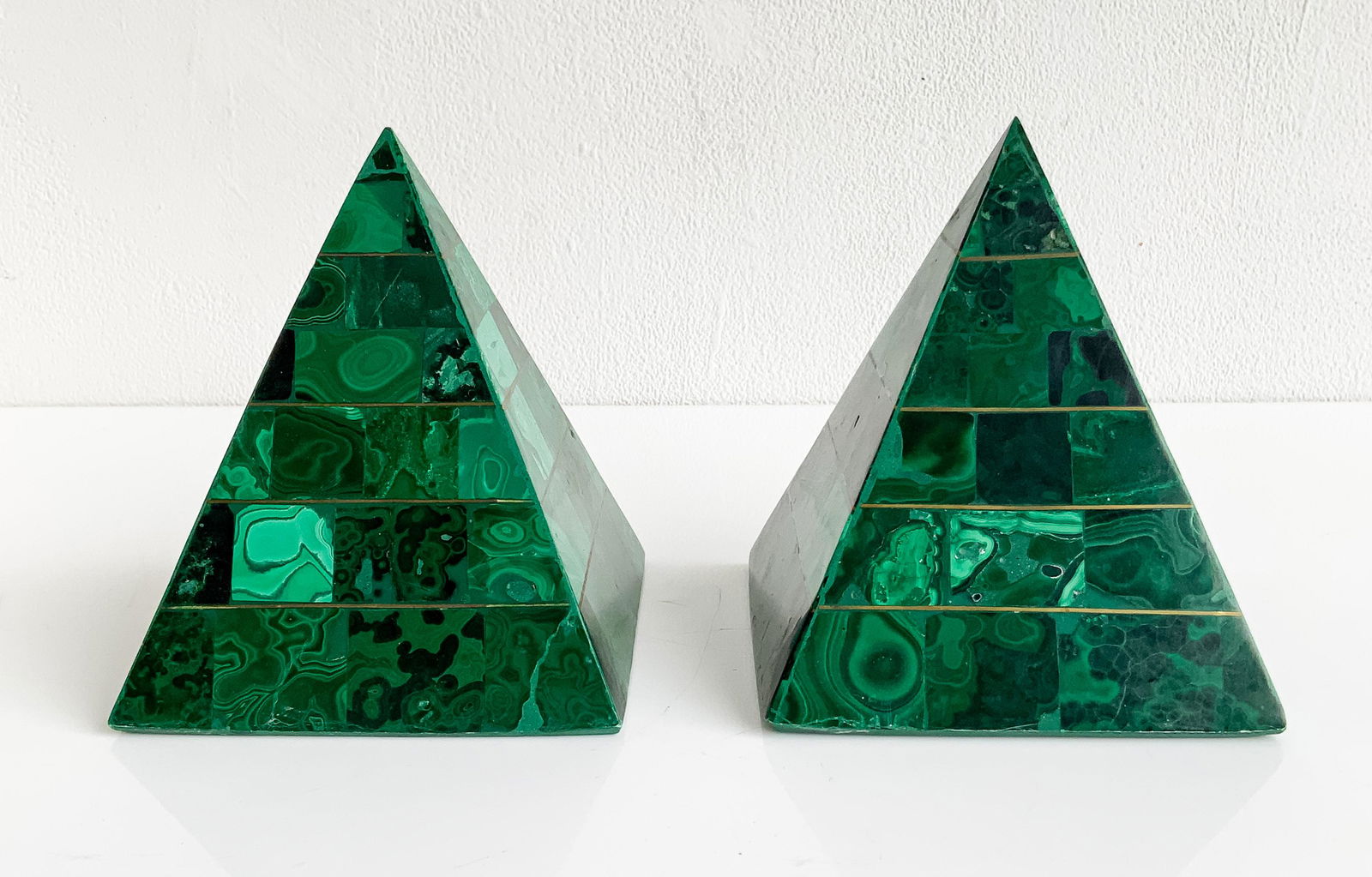 Pair of Malachite Veneer and Brass Pyramids: Lot 143 Pair of Malachite Veneer and Brass Pyramids height: 6 1/4 inches Provenance: From a Private New York Collection