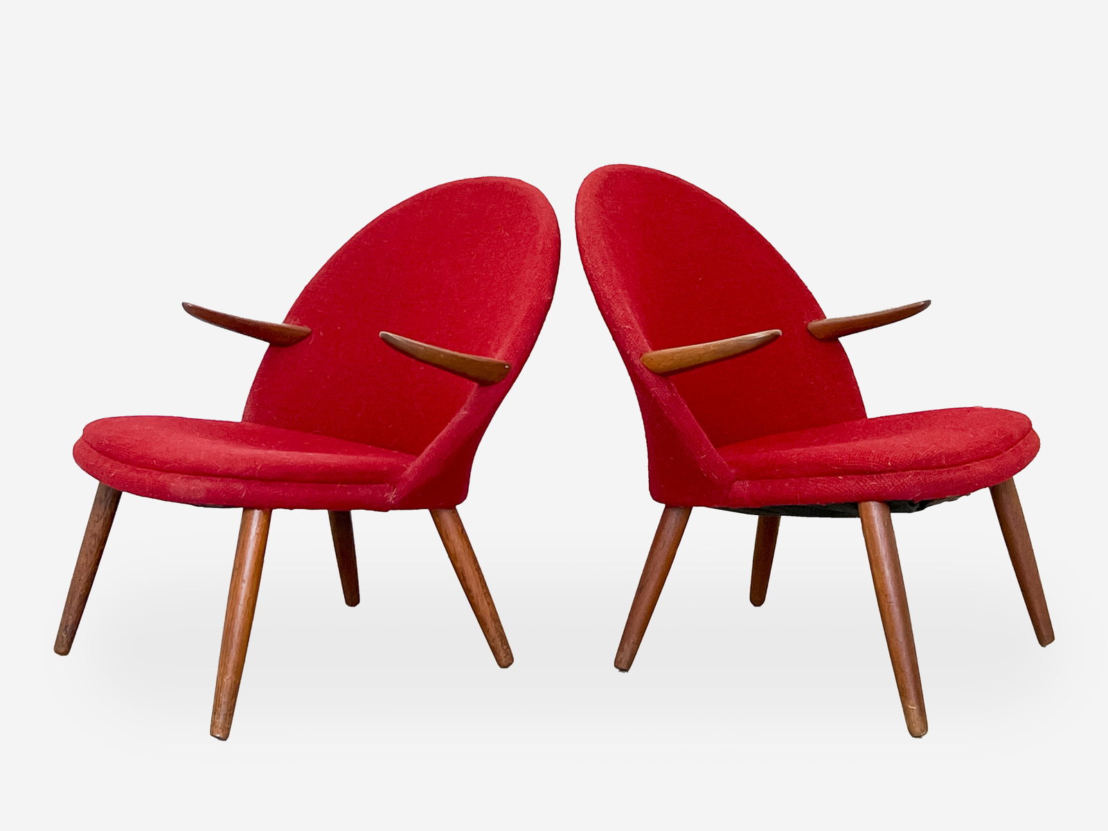 Kurt Olsen for Glostrup Møbelfabrik, Pair of Chairs: Lot 121 Kurt Olsen for Glostrup Møbelfabrik, Pair of Chairs having teak armrests and legs, with red wool upholstery, made in Denmark 31 x 27 1/2 x 27 inches seat height: 16 inches Provenance: fro