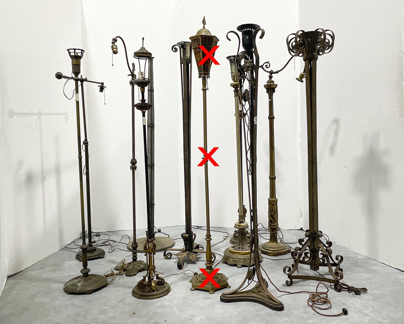 Assortment of 11 Floor Lamps, in the style of Oscar Bach and Edgar Brandt: Lot 159 Assortment of 11 Floor Lamps, in the style of Oscar Bach and Edgar Brandt of various styles, one with onyx details, one with Greco-Roman style figural frieze to base tallest: 65 inches Additi