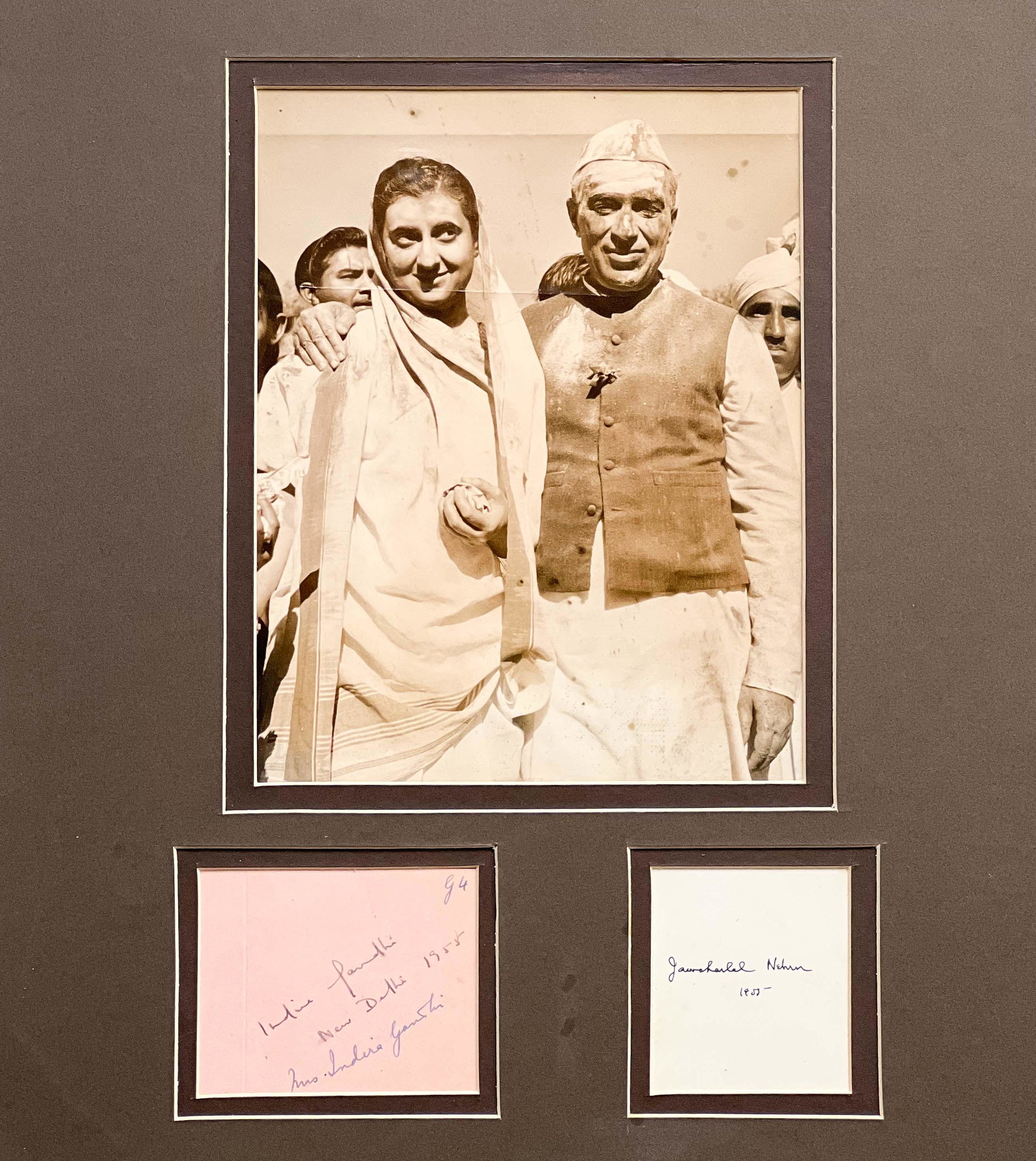 Jawaharlal Nehru, Indira Gandhi Signatures: Lot 191 Jawaharlal Nehru, Indira Gandhi Signatures image above their signatures and dated 1955 overall: 16 3/4 x 15 inches unframed Additional Information: Nehru served as India's first Prime Minister