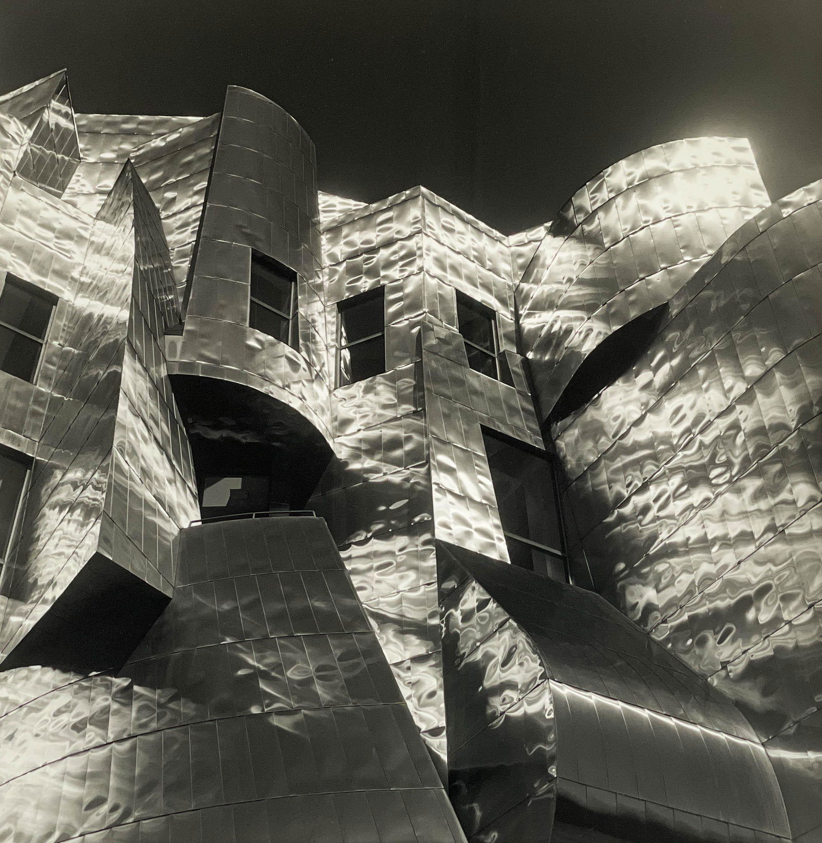 Lynn Davis - Gehry Facade (Weisman Art Museum), Minneapolis, MN, 1997: Lot 121 Lynn Davis American (b. 1944) Gehry Facade (Weisman Art Museum), Minneapolis, MN, 1997 (printed 1998) gelatin silver print signed and editioned 5/10 in ink verso (under frame) 38 1/2 x 30 inch