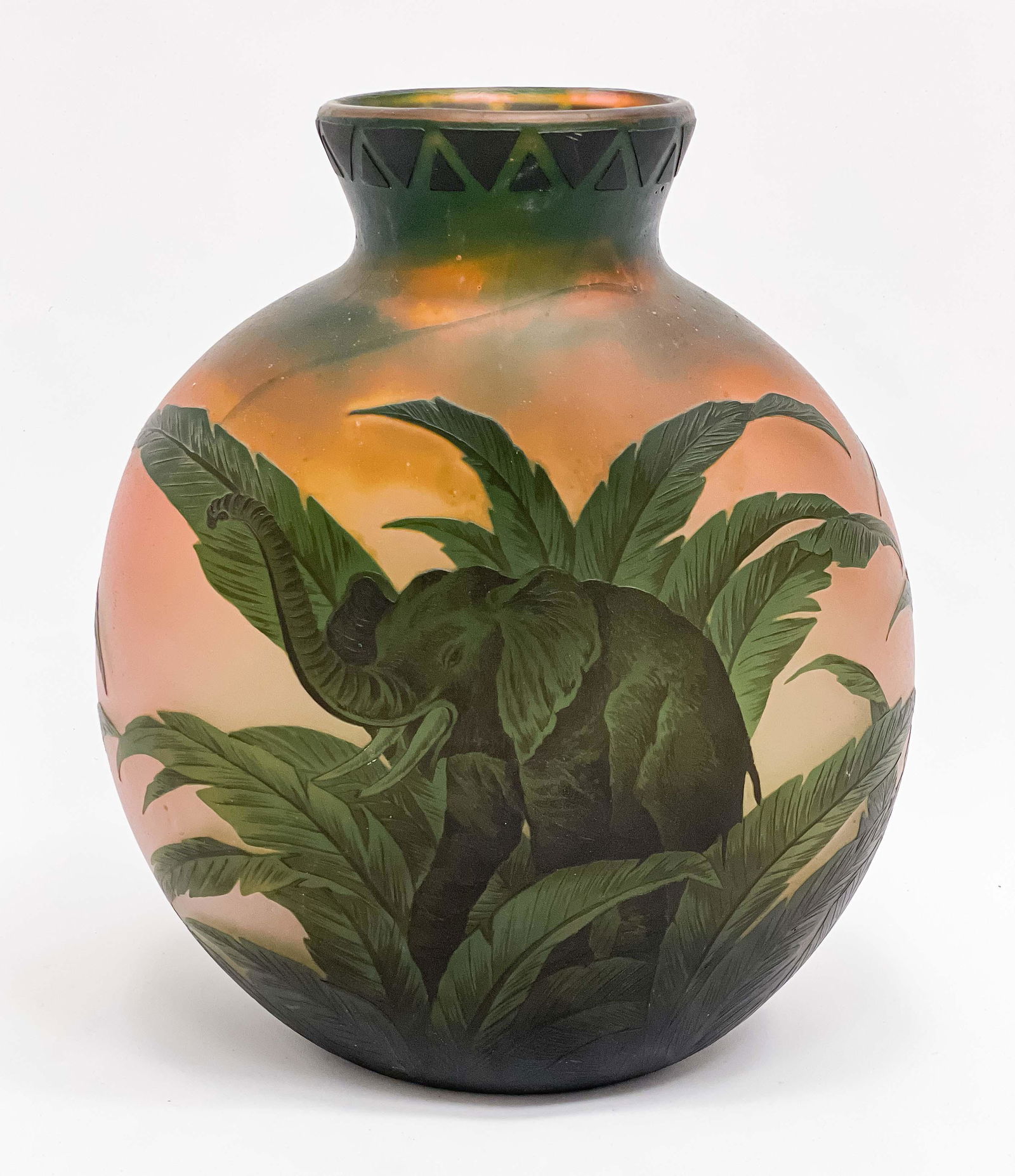 Muller Freres Luneville Cameo Glass Vase (damaged): Lot 111 Muller Freres Luneville Cameo Glass Vase (damaged) (circa 1930) the large vase with scenic decoration of figures hunting an elephant, signed to side 14 3/4 x 12 x 5 1/2 inches Provenance: Pro