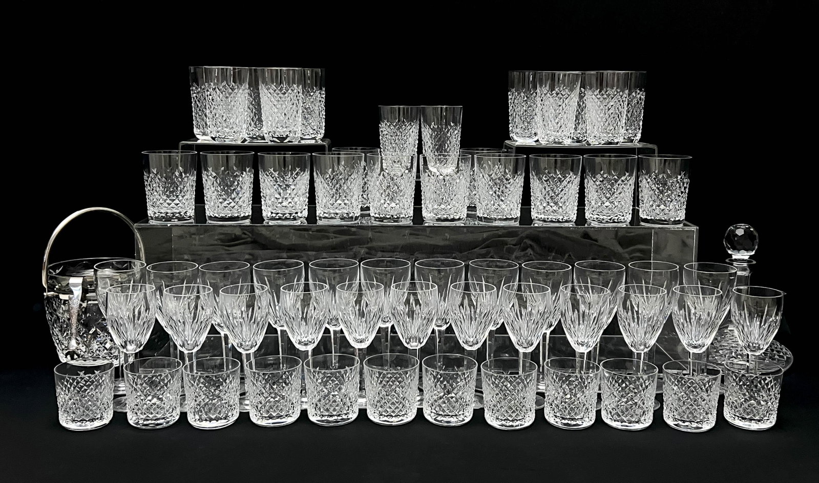 Waterford (Co.) - Assorted Drinking Service for 12 with Decanter and Ice Bucket: Lot 161 Waterford (Co.) Irish (est. 1783) Assorted Drinking Service for 12 with Decanter and Ice Bucket crystal comprising: a ship decanter in ”Lismore” pattern; 12 claret wine glasses and